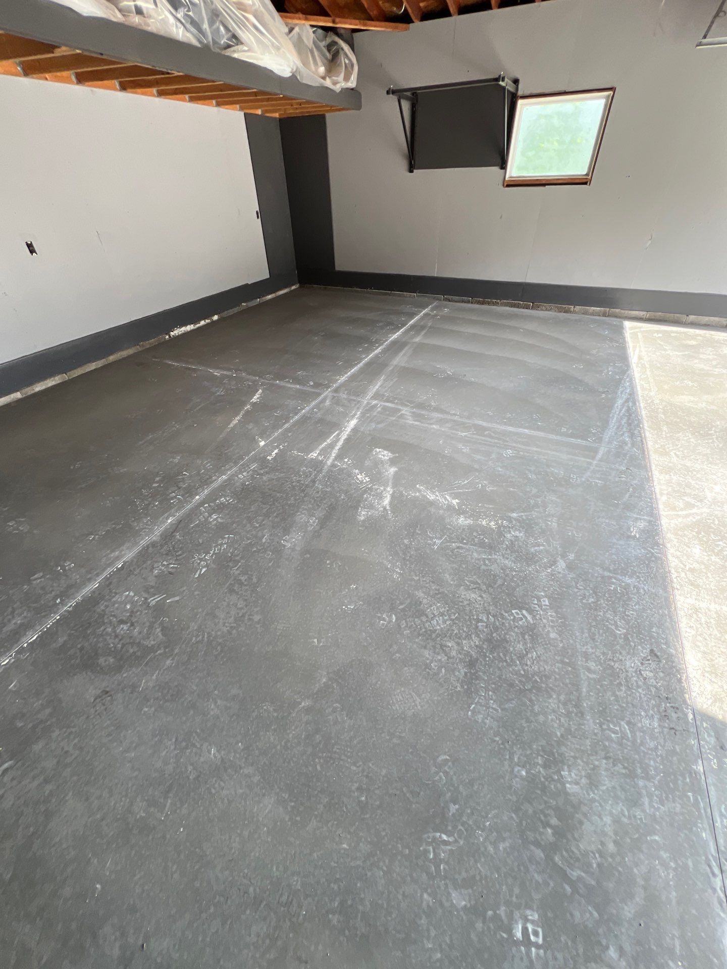 Concrete garage floor replacement and epoxy coating installed  by NG Masonry & Construction LLC