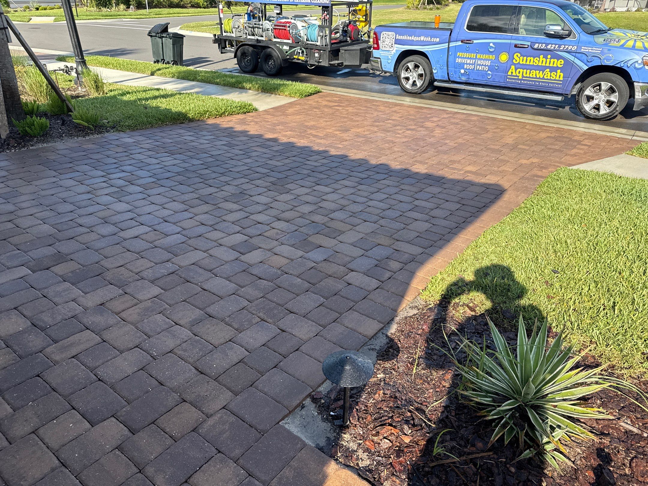 Oil Stain Removal on Paver Driveway | Esplanade at Artisan Lakes, Palmetto FL by Sunshine AquaWash