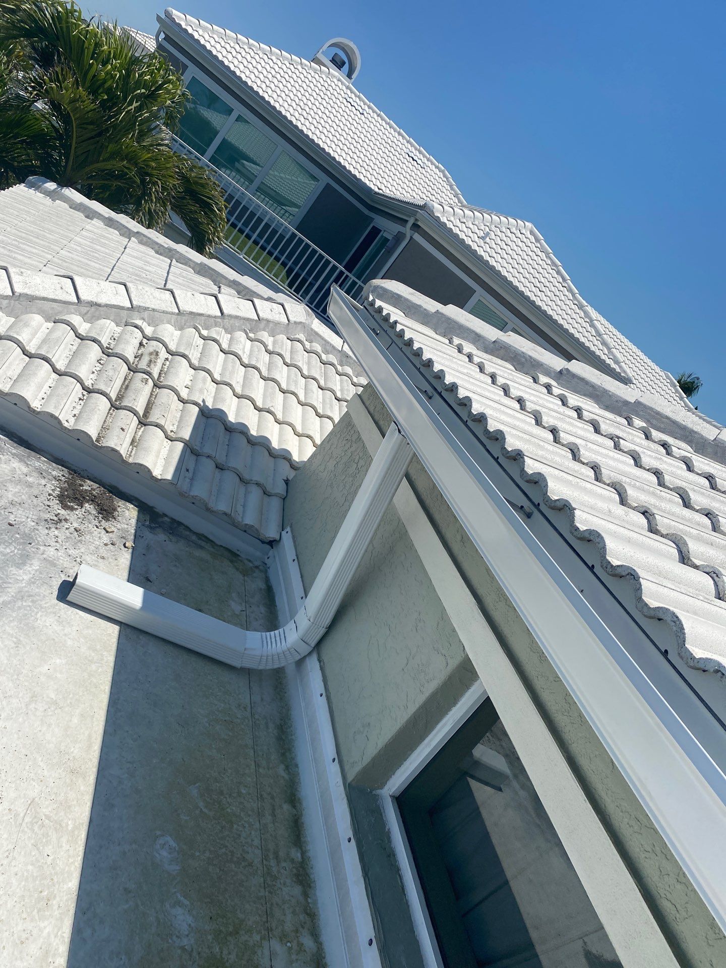 Splash Guard Gutters for Coastal Homes in Longboat Key FL by Gutter Professors