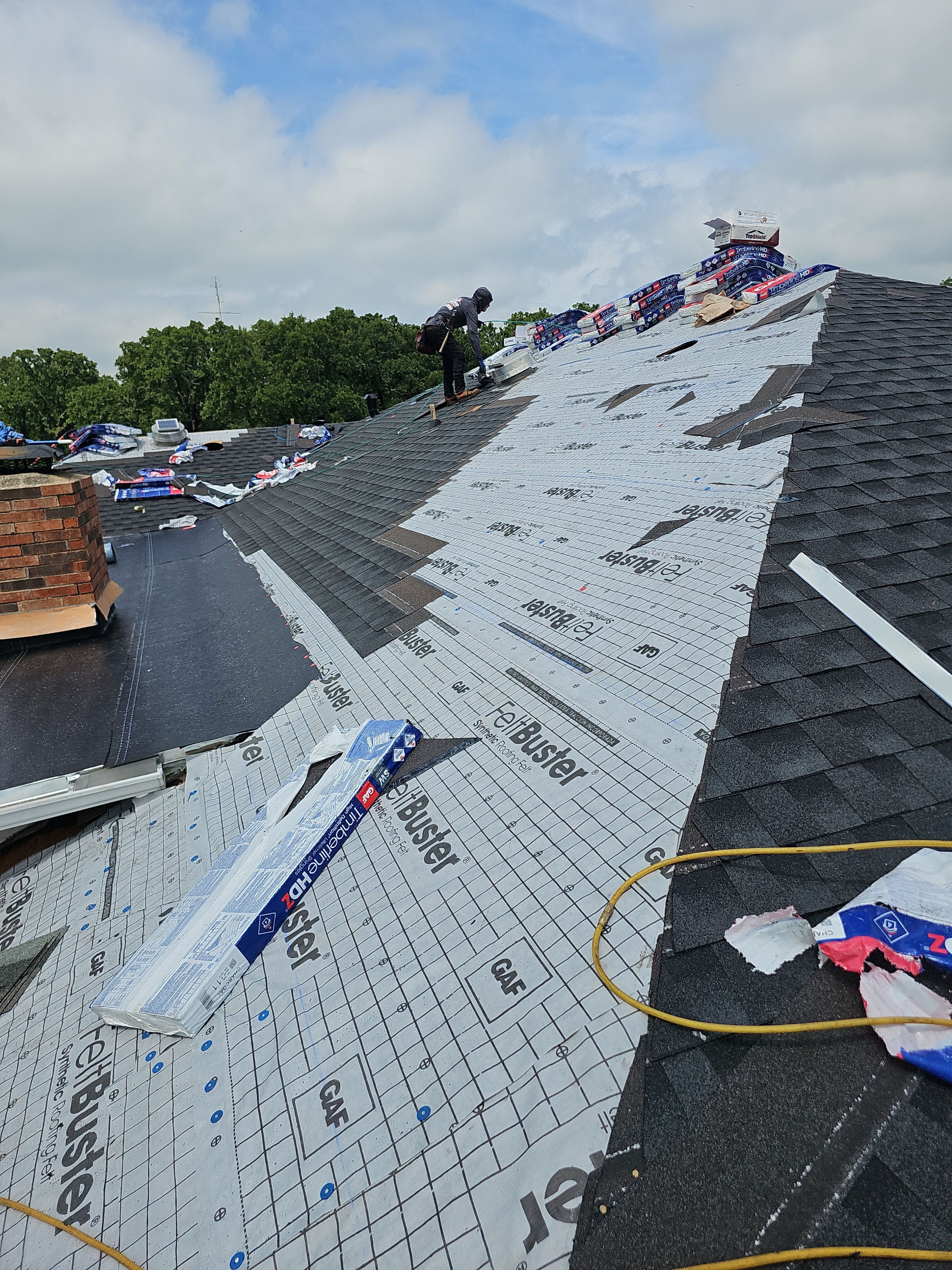 "Full Roof Replacement Due to Hail and Water Damage – Before & After" by road roofing llc