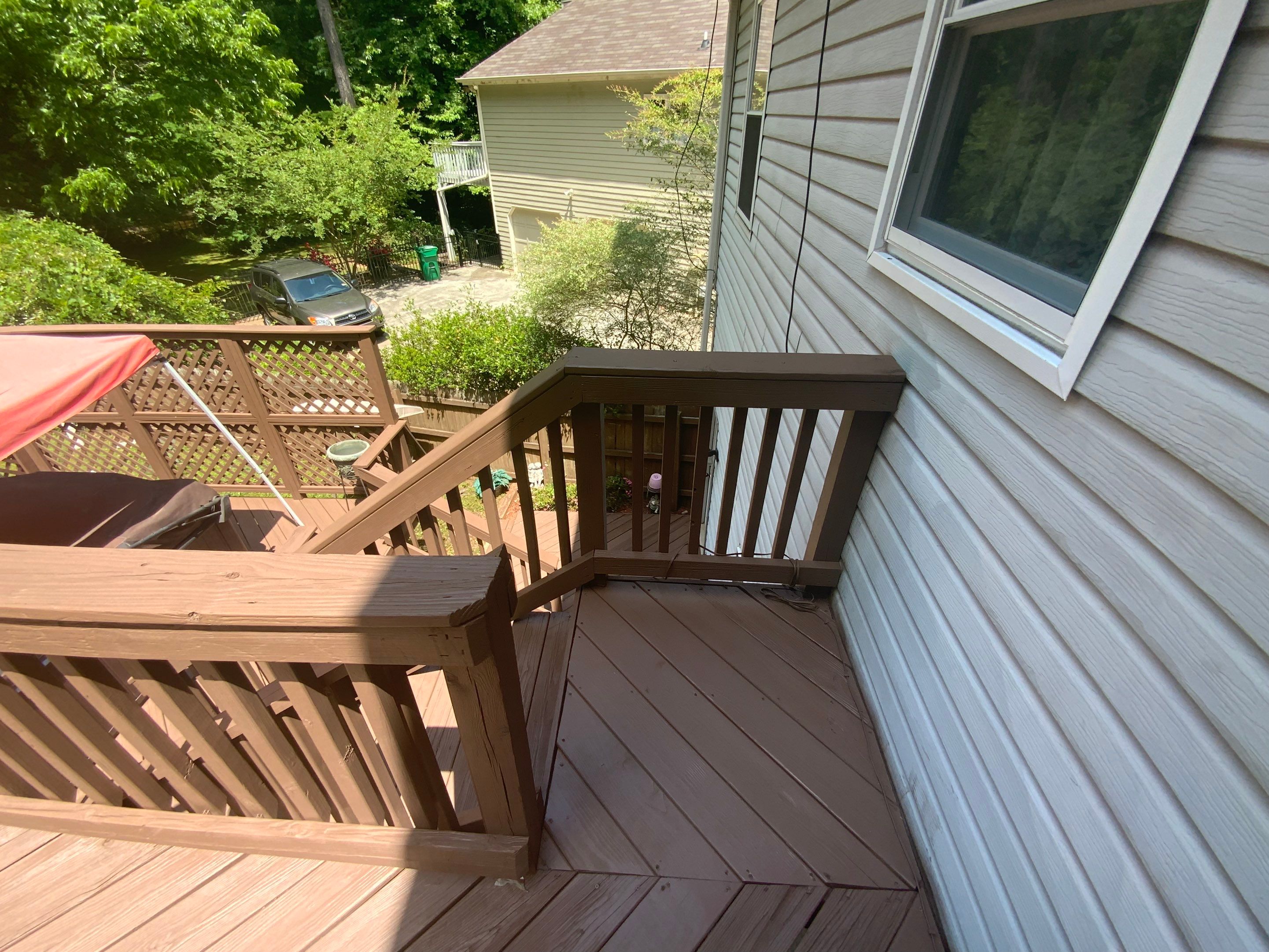 Multi-Level Wood Deck Repair and Staining in Tucker, Georgia by Swift Home Renovations
