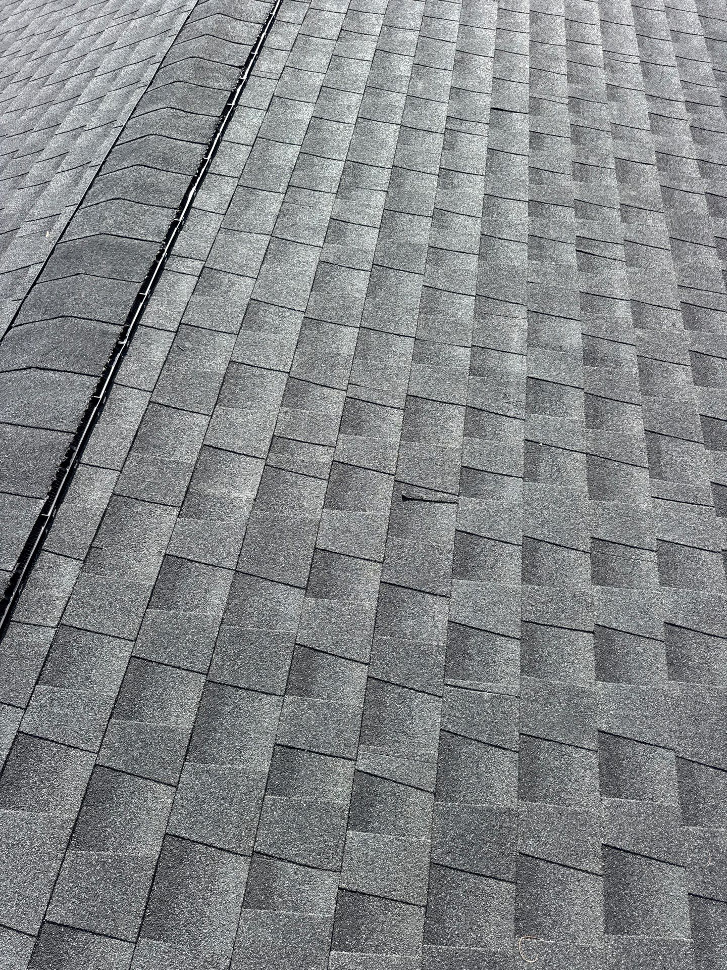 Residential Roofing Installation using GAF Timberline HDZ Charcoal by Rainstoppers Roofing