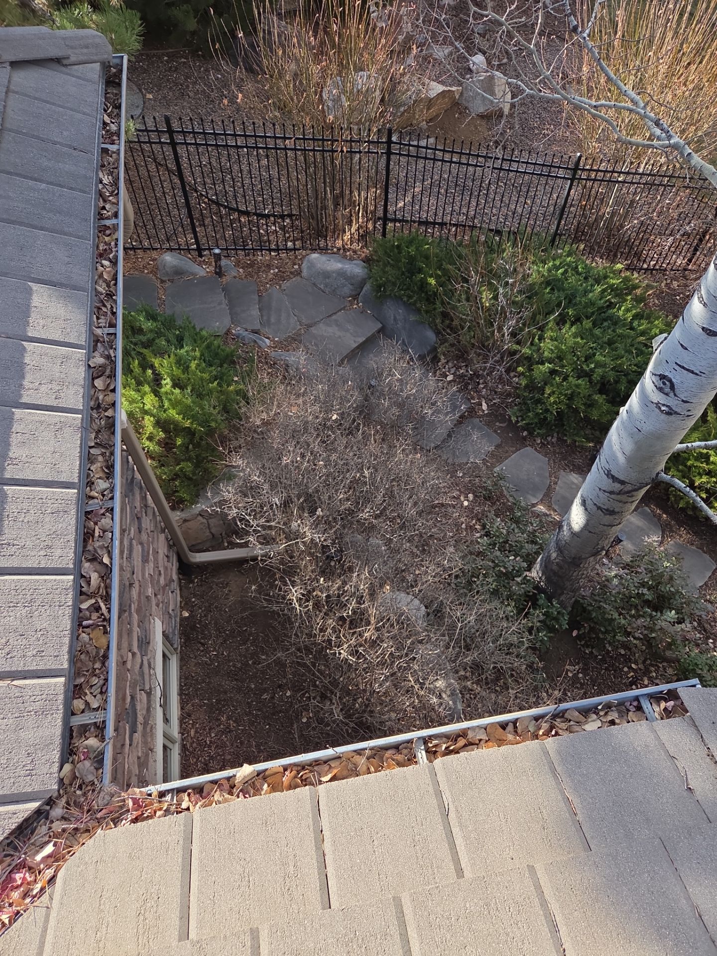 Gutters and Downspout Cleaning by RTP Roofing Company