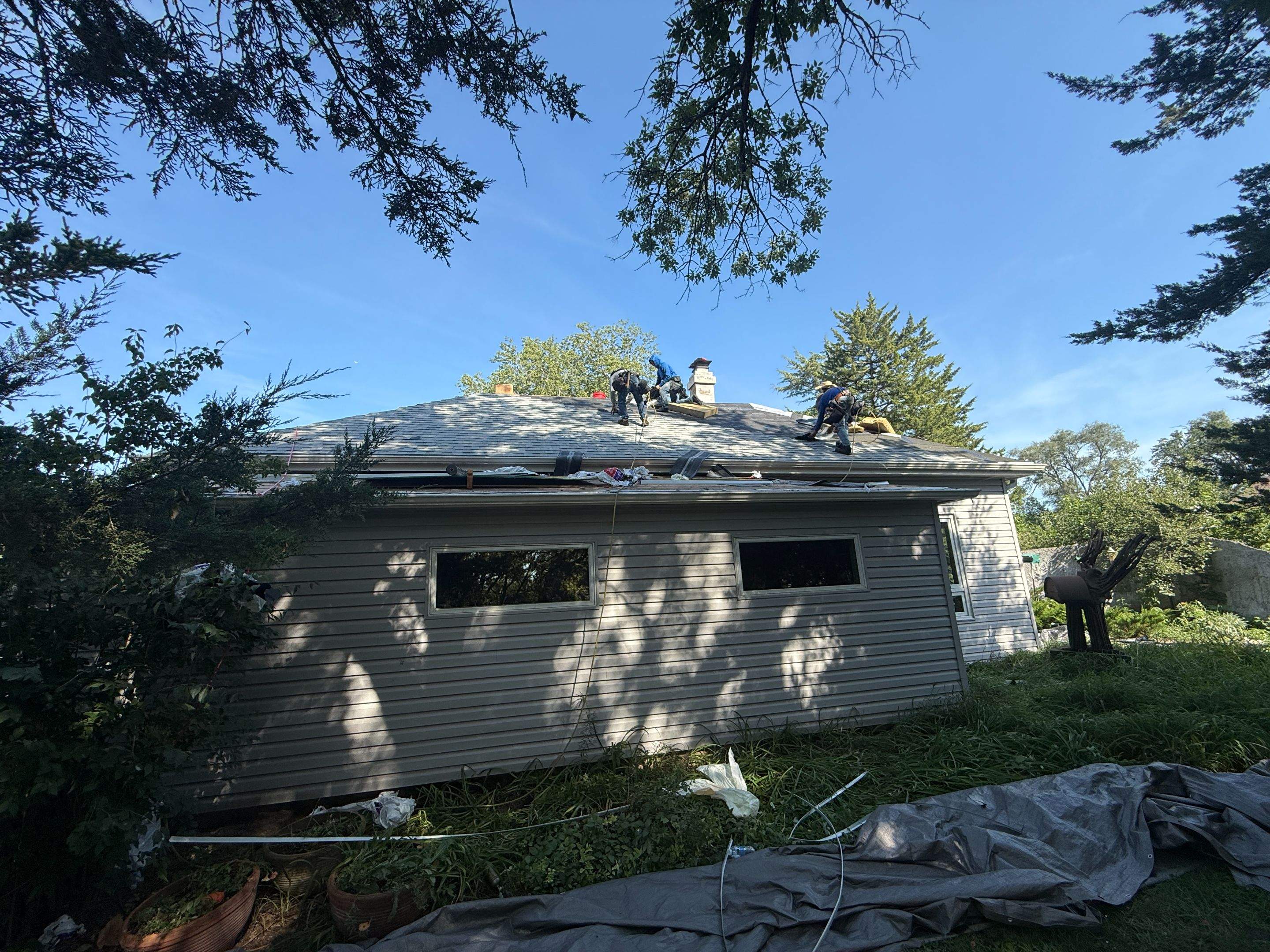 Asphalt Shingle and EPDM Membrane Roof Installation in Mineola by Star Home