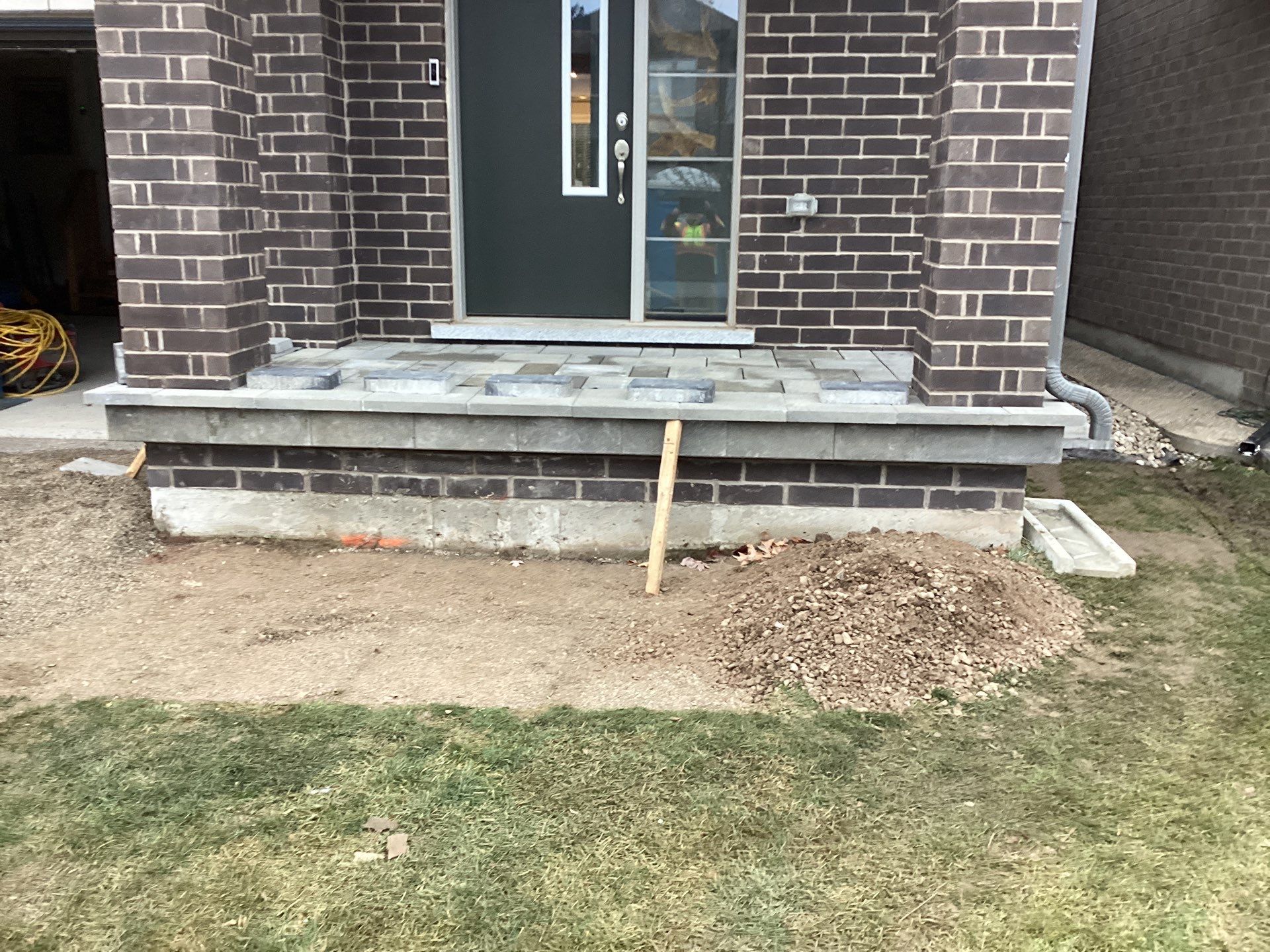 Front Entrance & Lounge Patio by Soares Landscaping