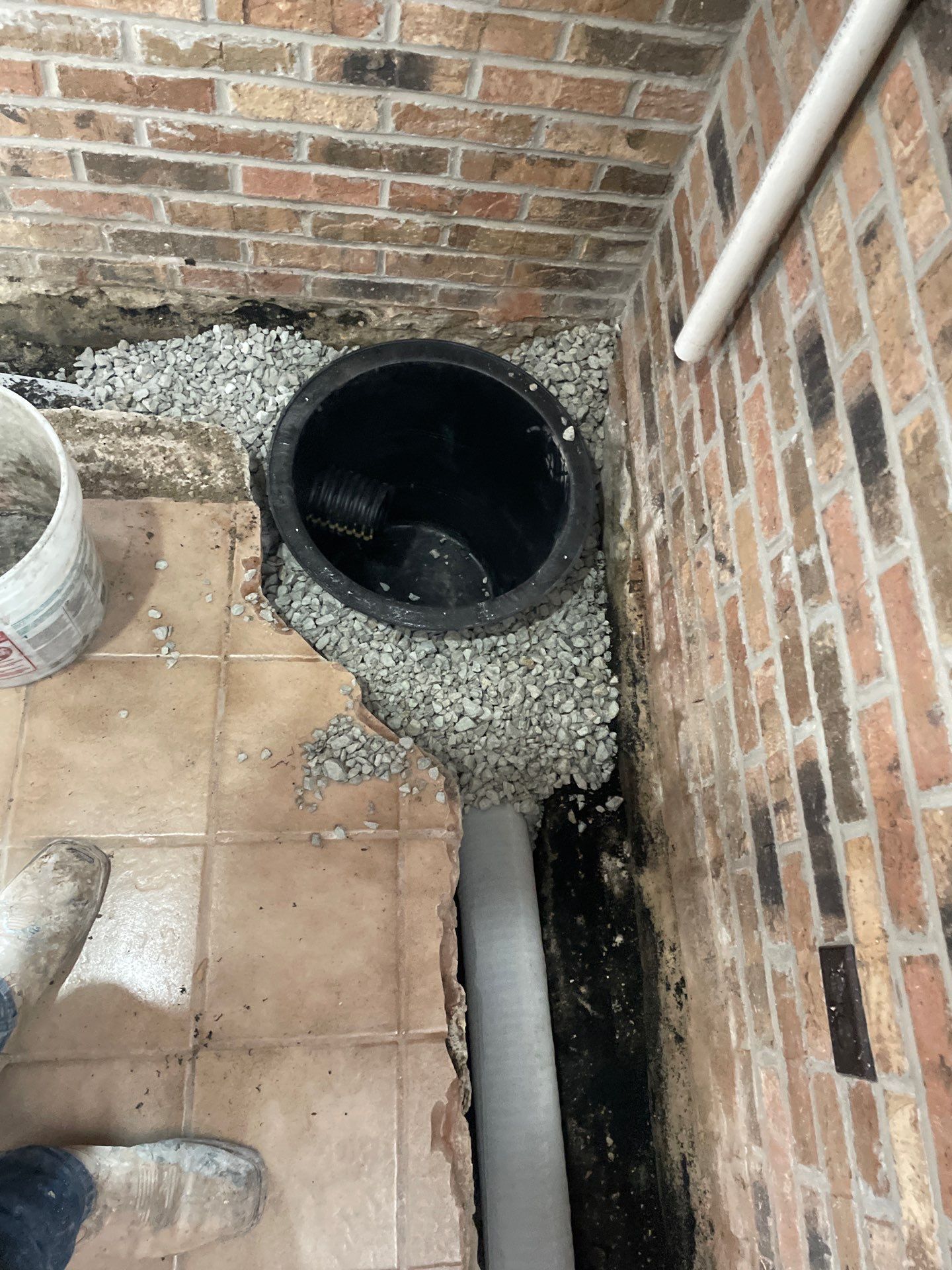 Interior Drain Tile System in Elwood by Area Wide Waterproofing