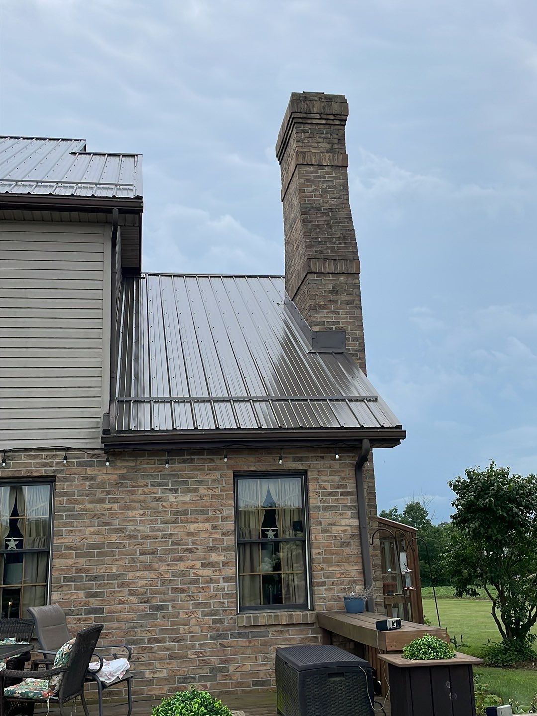 Residential Roofing Installation using Performance Panel Metal - Burnished Slate by RoofX 