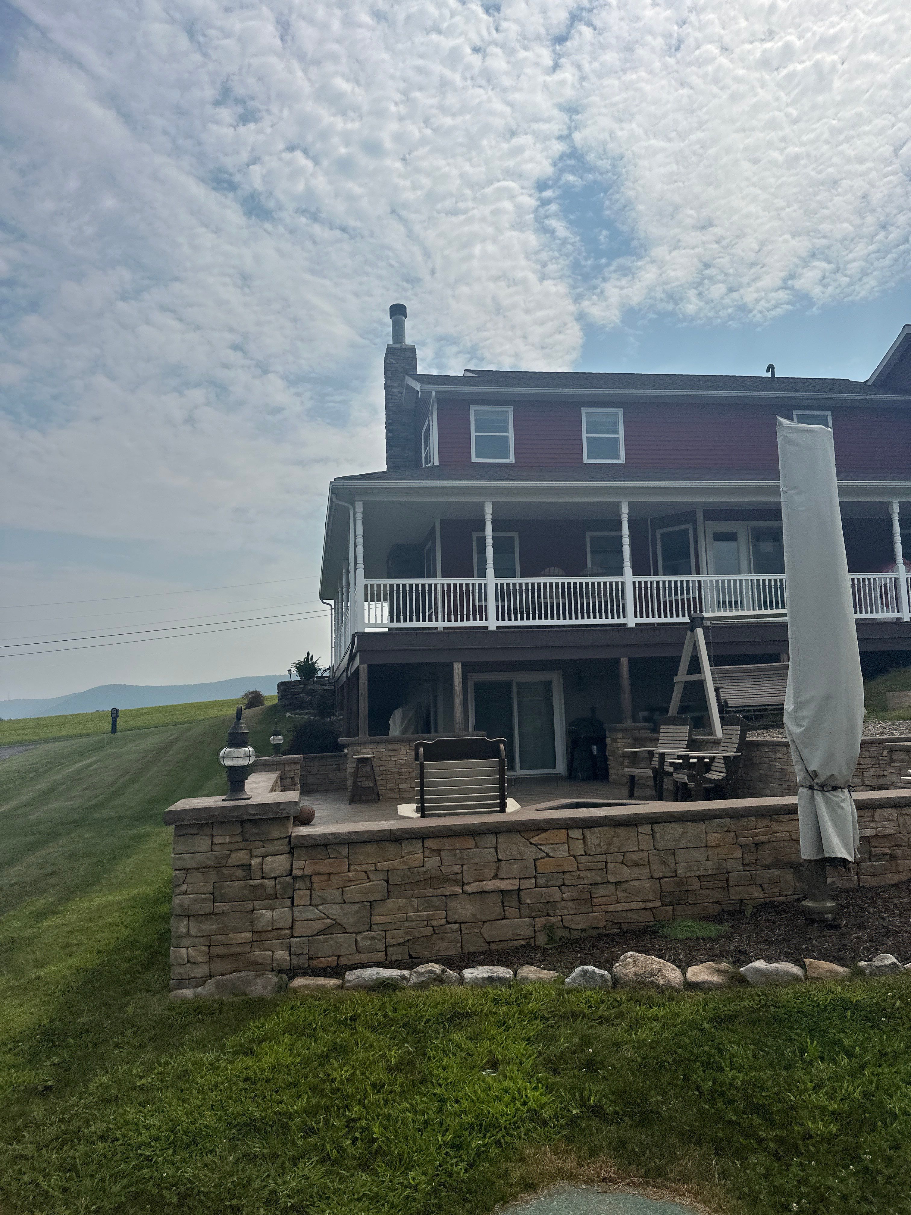 Covered Deck Addition With Custom Gable Roof in Tower City by Esh Builders