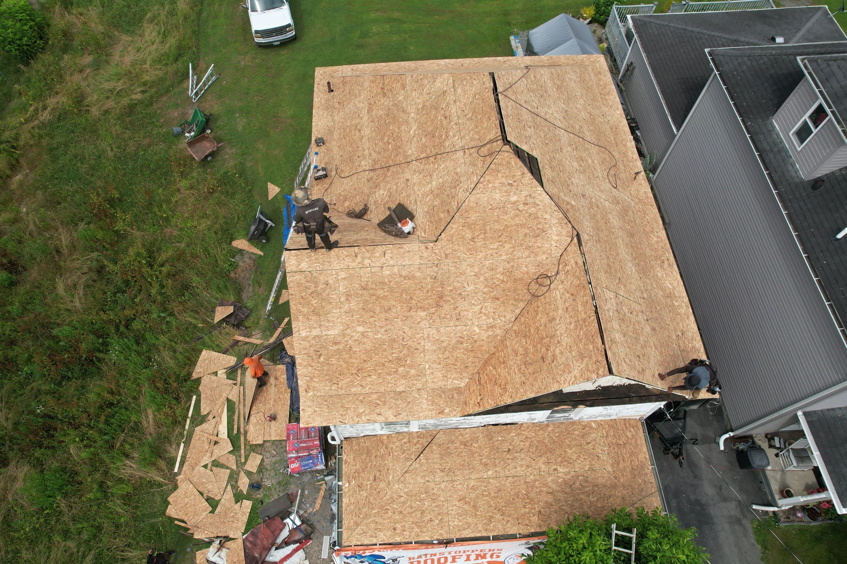 Residential Roofing Installation using GAF Timberline HDZ Charcoal by Rainstoppers Roofing