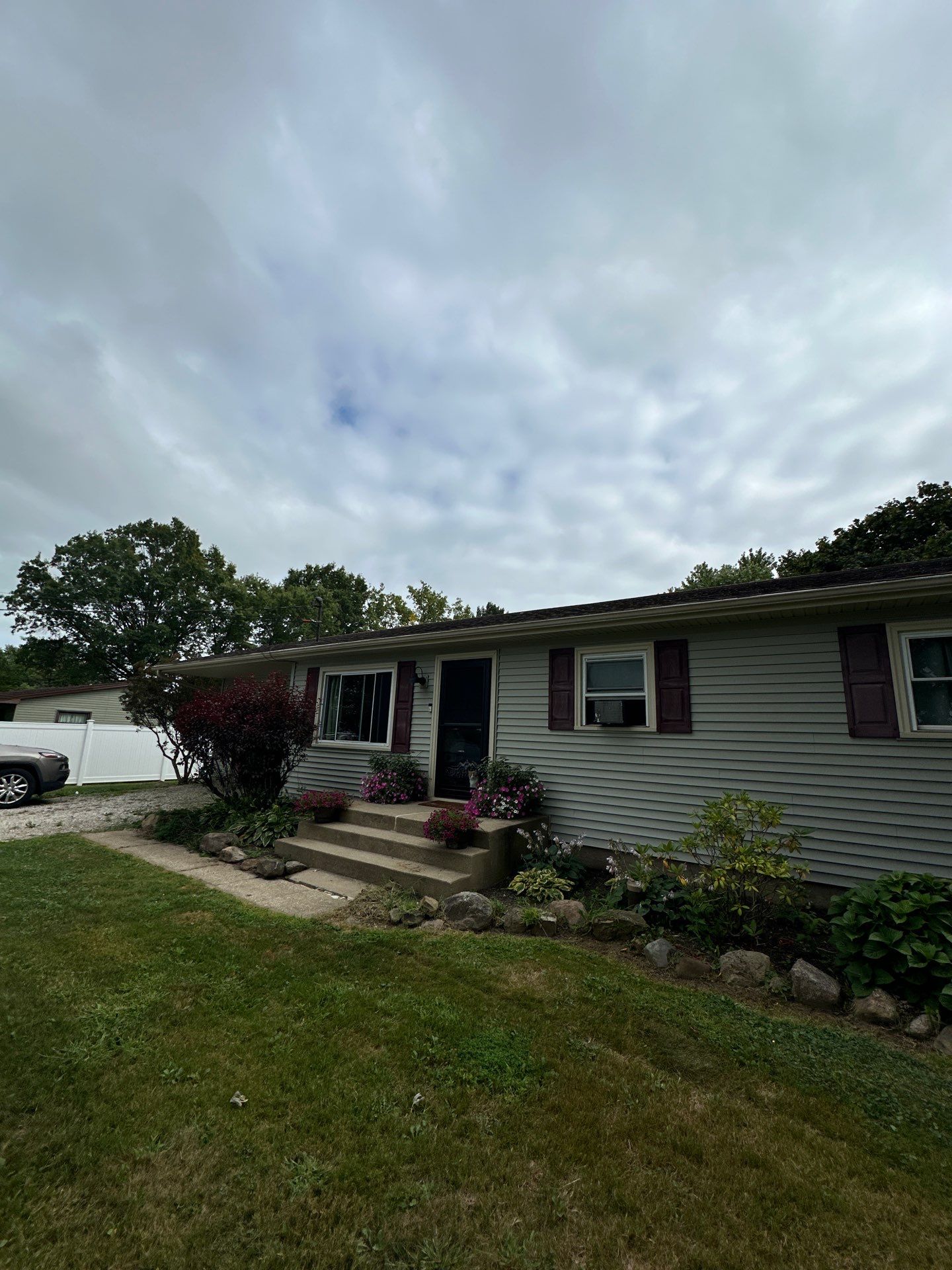 Night & Day: The Ultimate Black & White Exterior Makeover! by Cornerstone Roofing And Siding