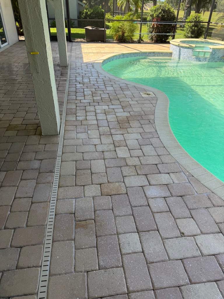 Professional Paver Sealing and Restoration for La Paloma Sun City Center Pool Deck by Supreme Paver Experts