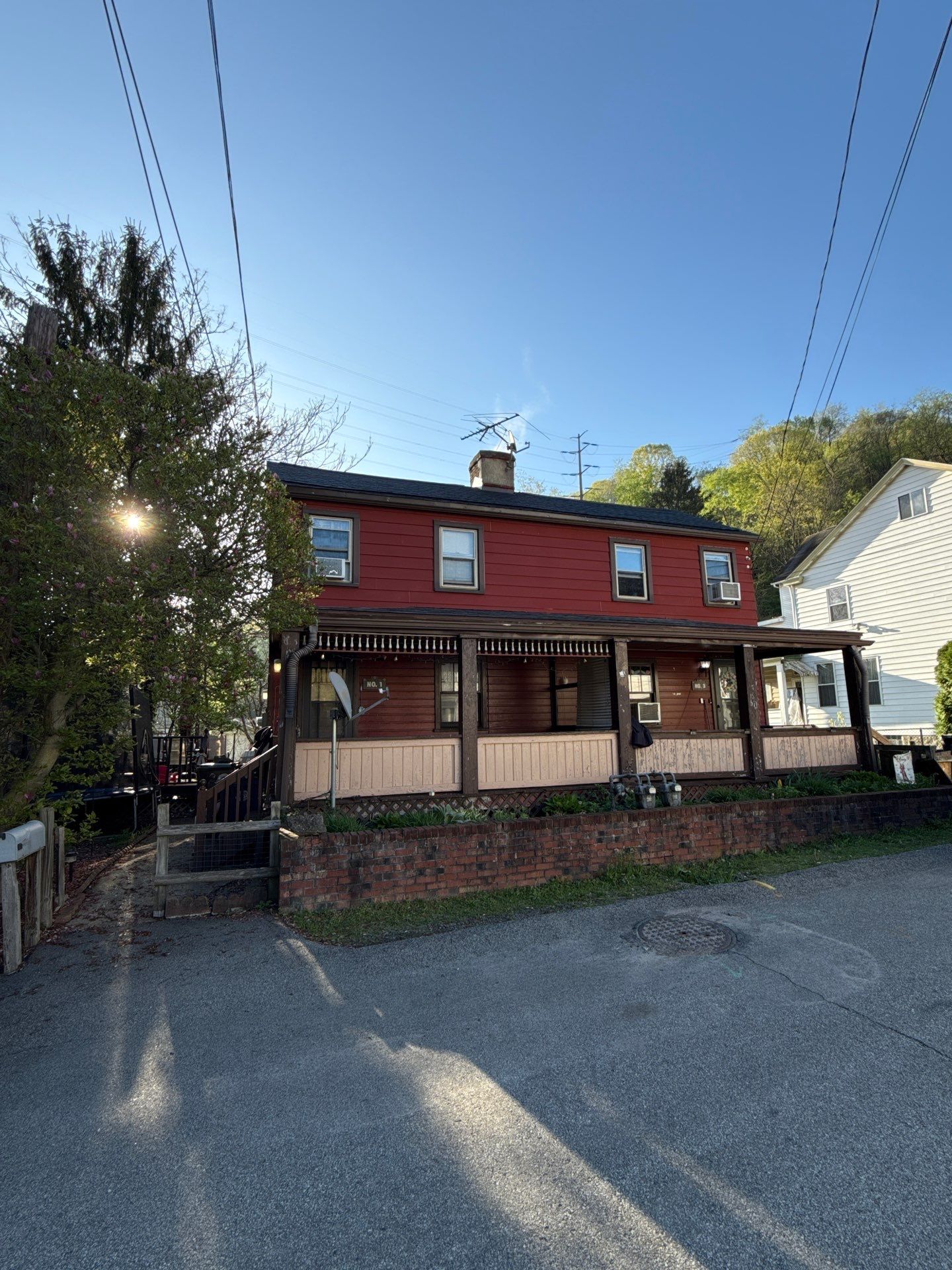 Roof sunspace deck  by Cousins Roofing Siding & Decks