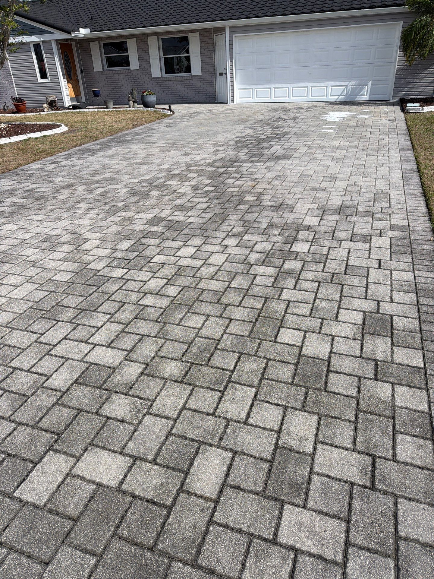 Paver Sealing and Restoration for Sun City Center Driveway by Supreme Paver Experts