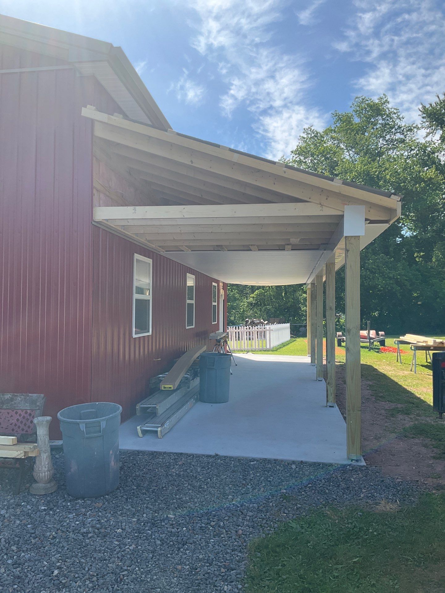 Covered Concrete Porch Addition and Exterior Door Installation in Tower City by Esh Builders