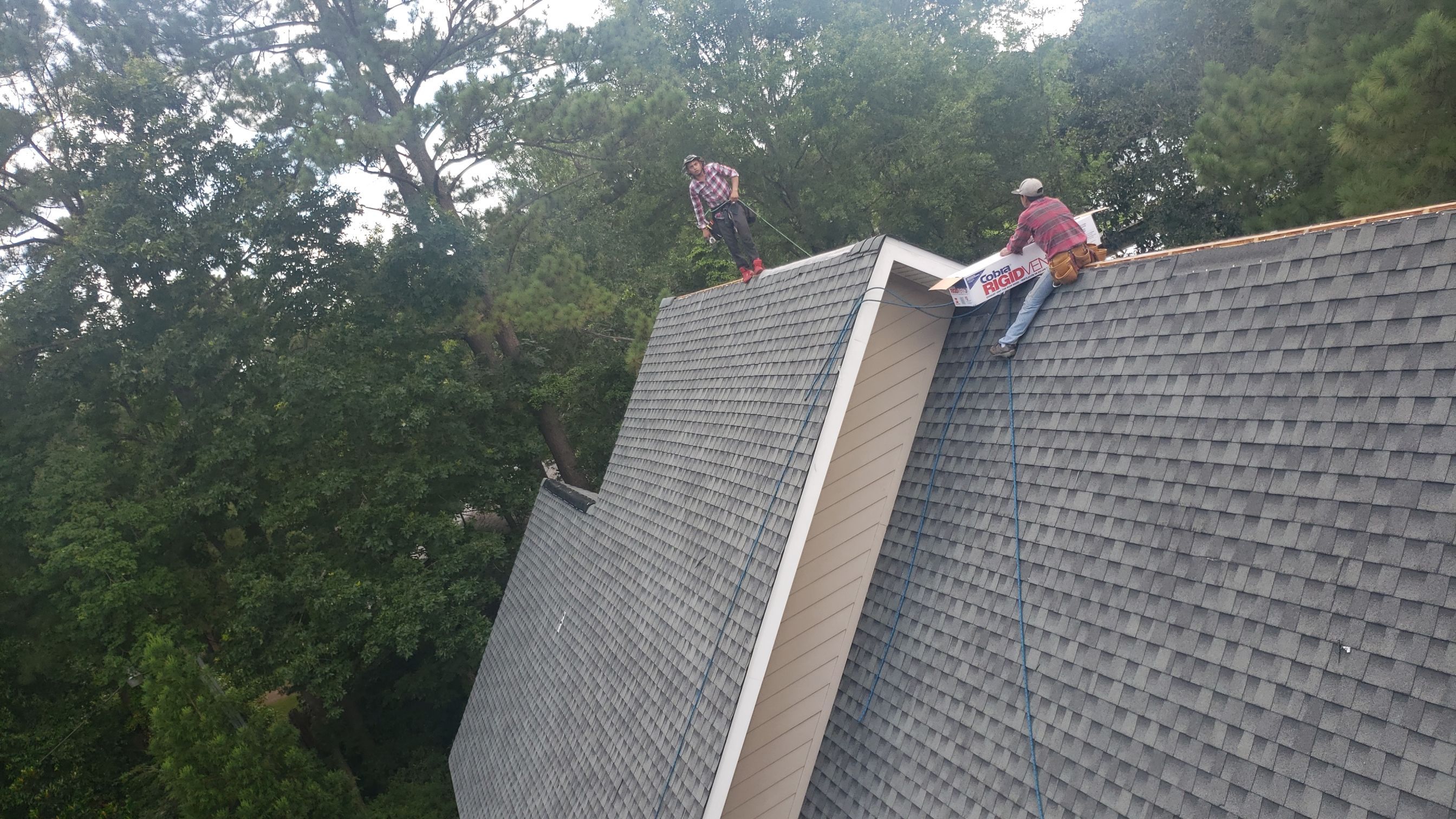 Residential Roofing Installation using Roof Replacement by American Roofing & Construction LLC