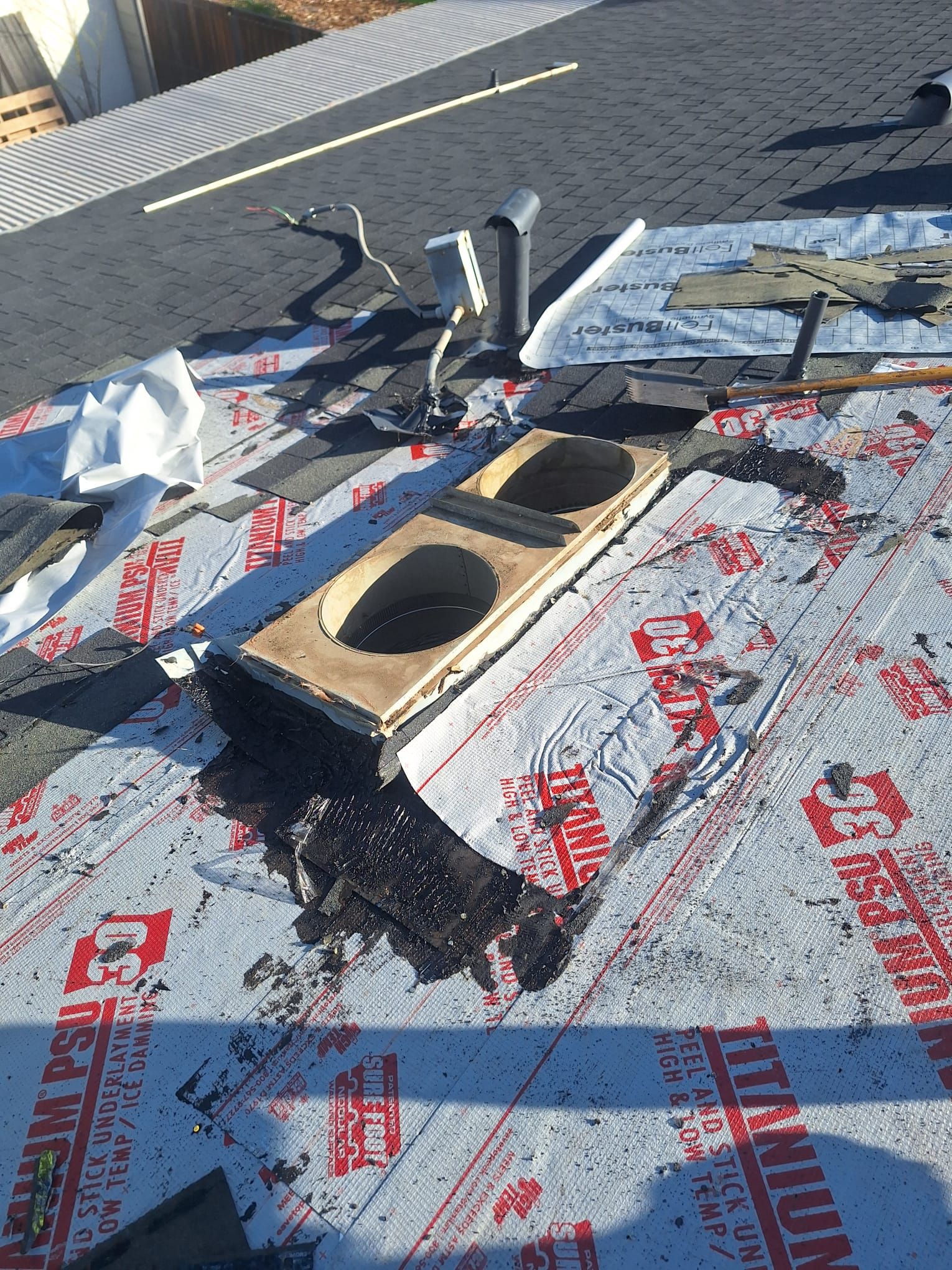 Onyx Black Shingles by Reimagine Roofing