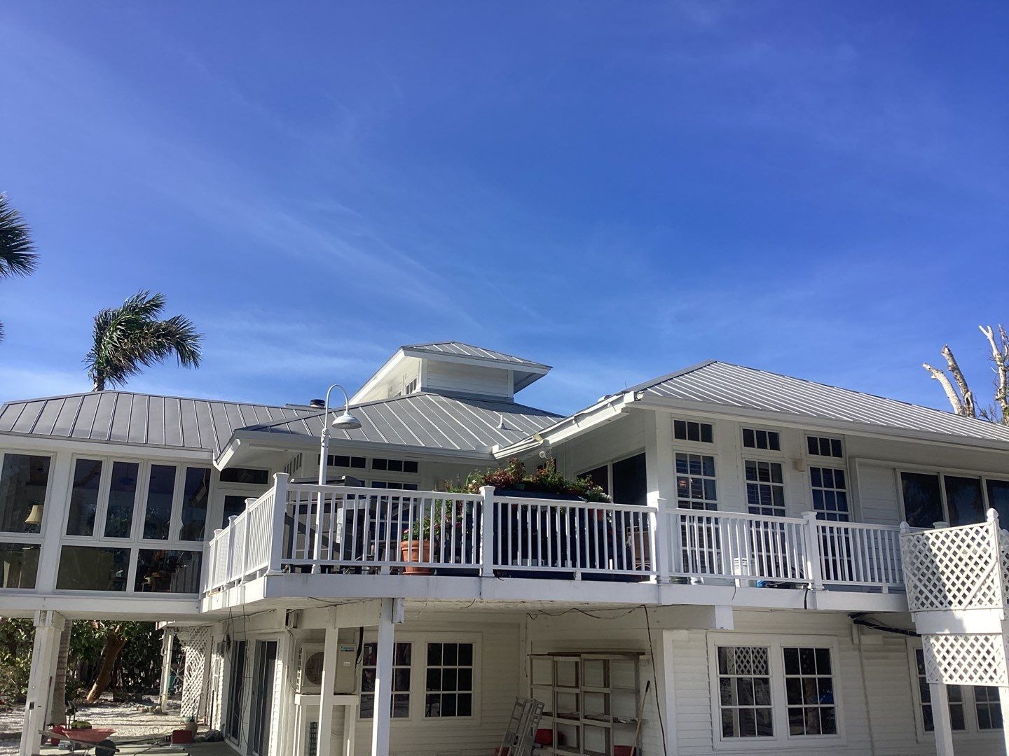 White Gutter Installation in Sanibel FL by Gutter Professors