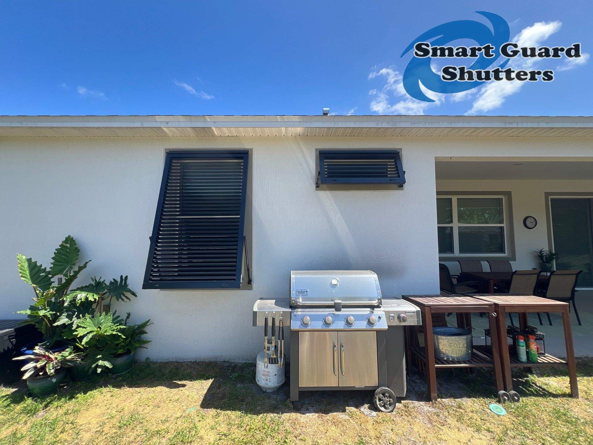 Impact Bahama Shutters in Jet Black MATTE by Smart Guard Shutters
