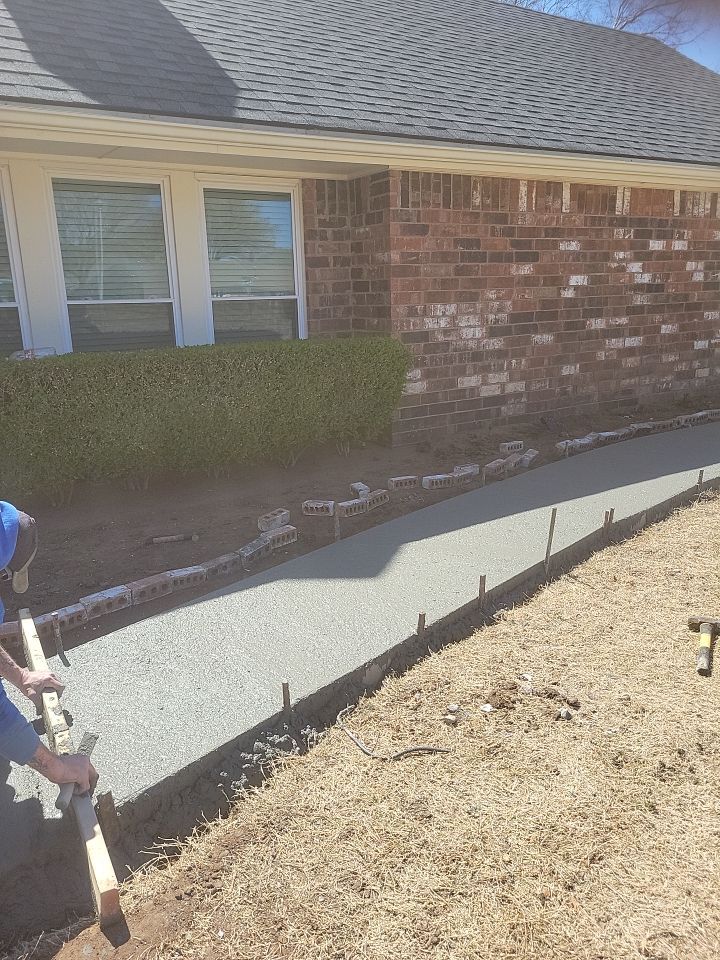 Concrete sidewalk using Concrete by Clays Services Inc