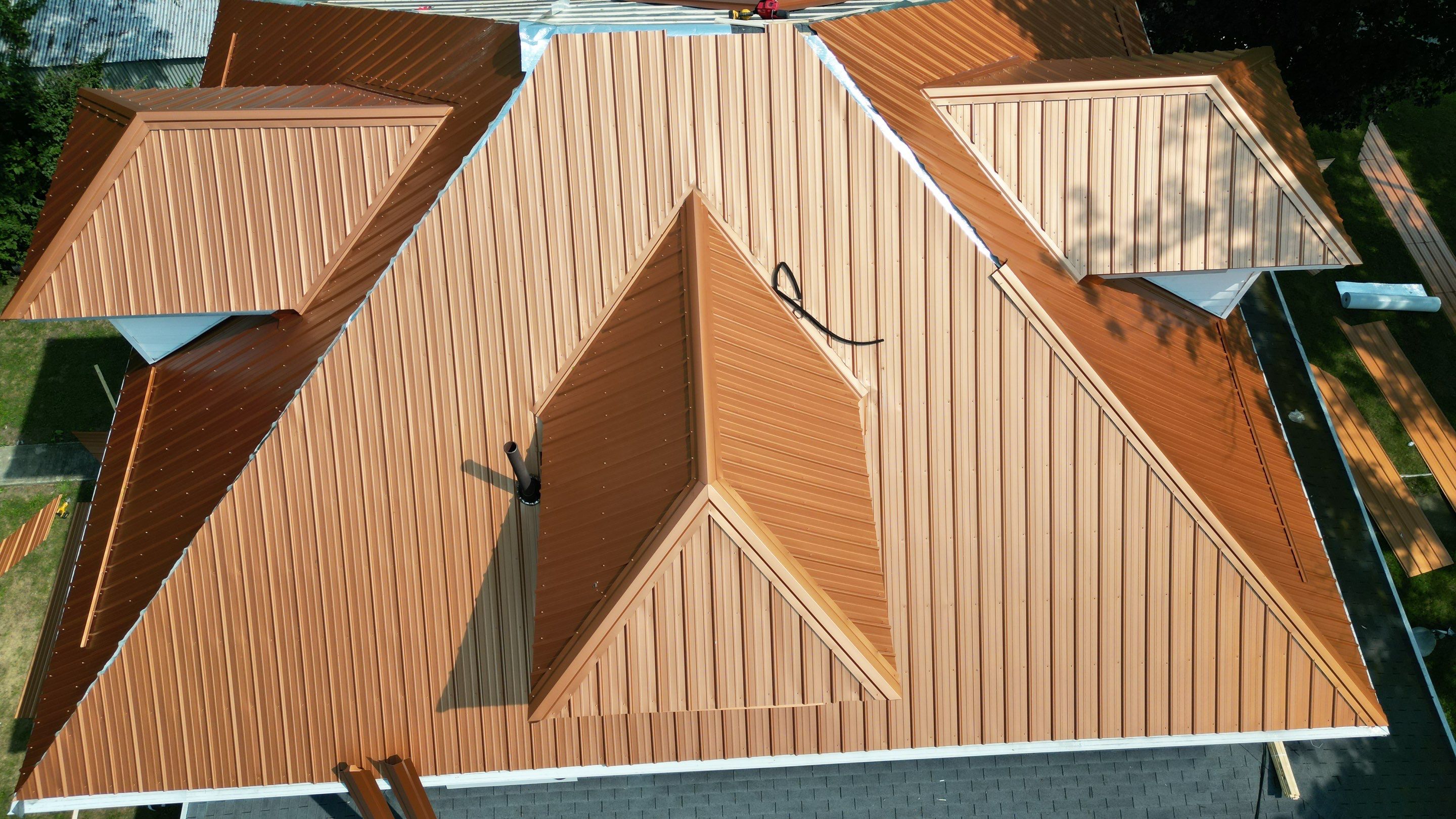 Residential Roofing Installation using Performance Panel Metal - Copper Metallic by RoofX 