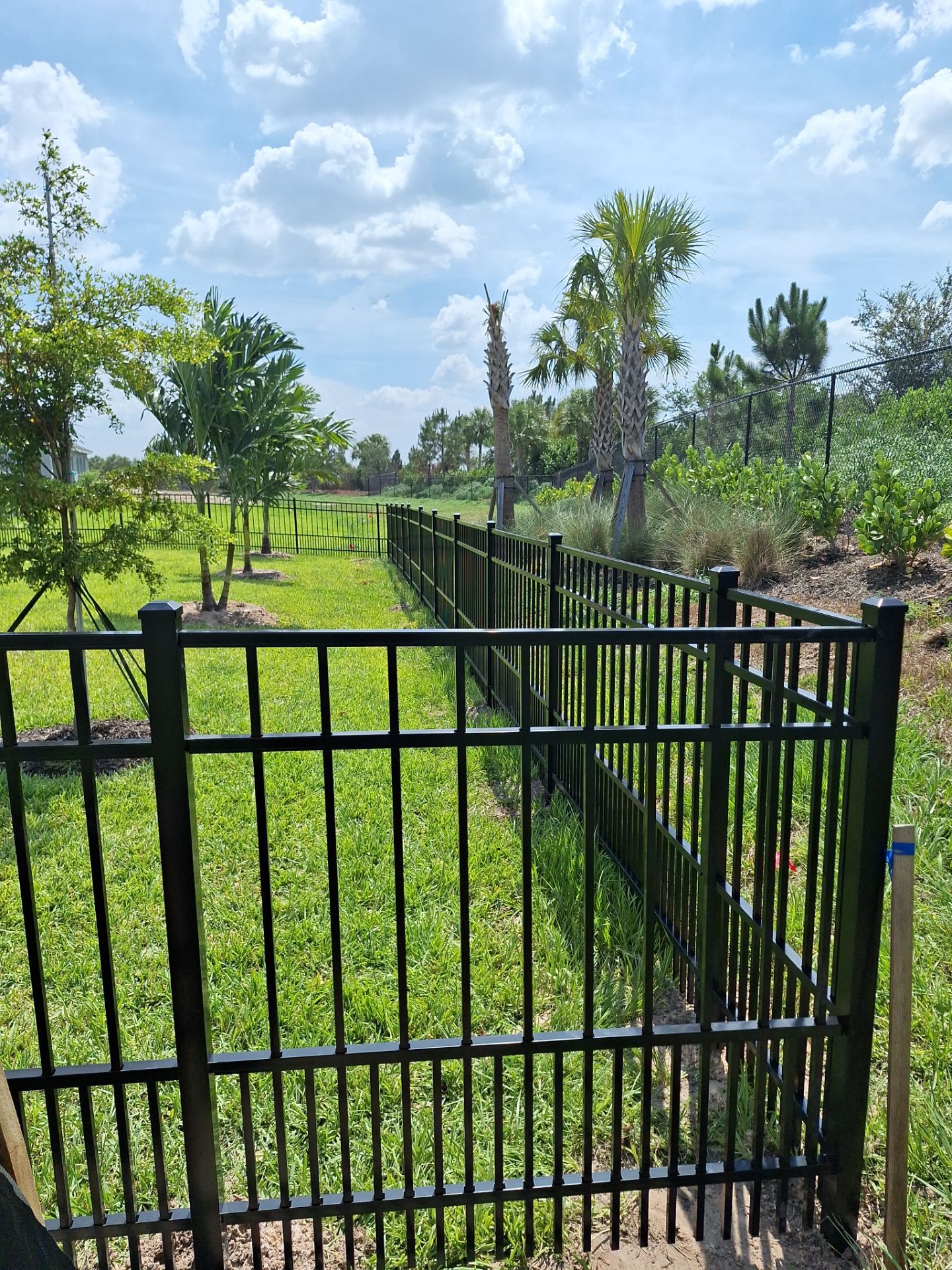 Aluminum Fence Installation using Black 3 Rail Aluminum Fence by Asap fence and gates, LLC