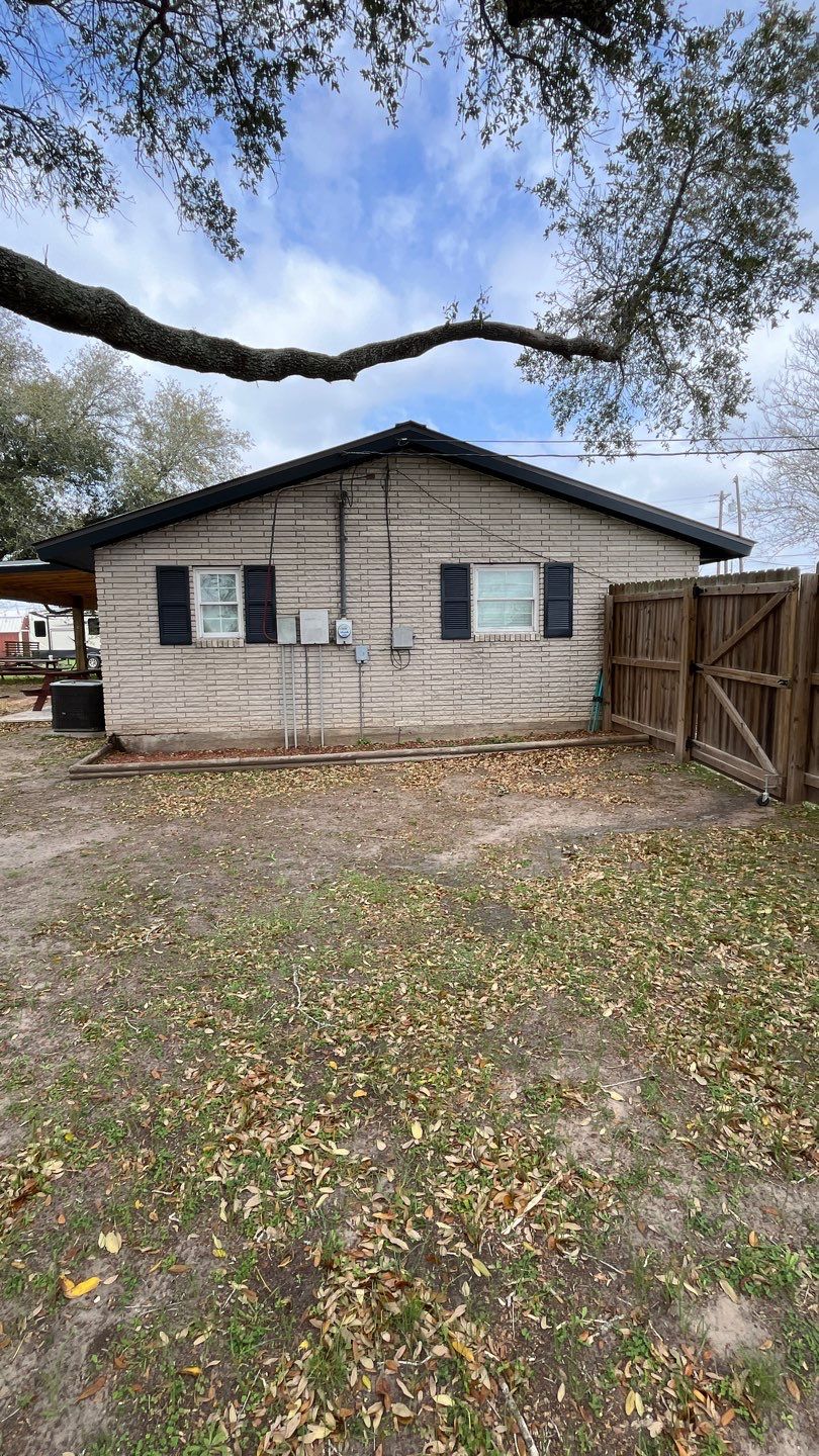 Beeville Backporch sittin' by Bayfront Roofing and Construction