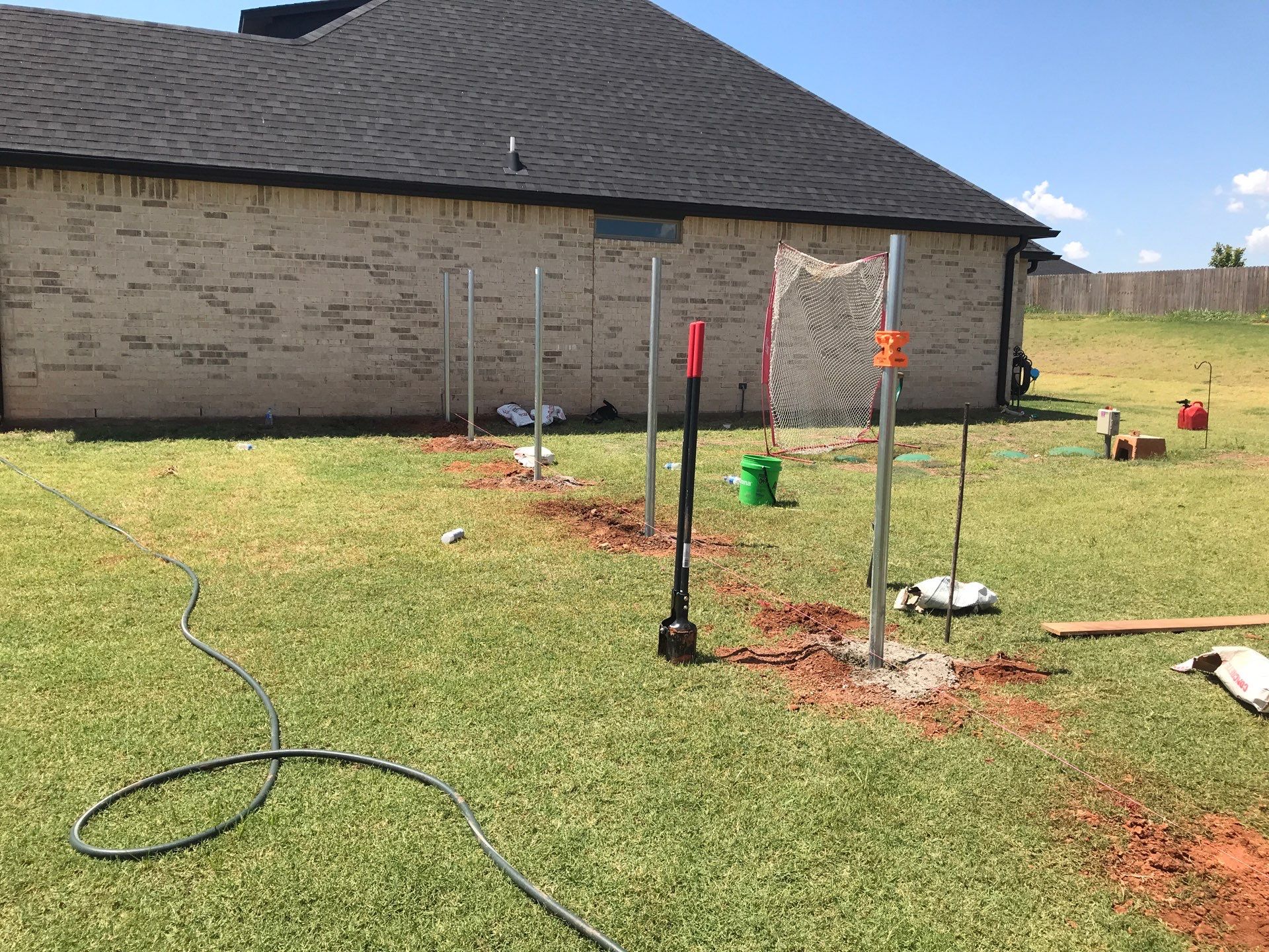 Cedar Fence using Metal Poles by Clays Services Inc