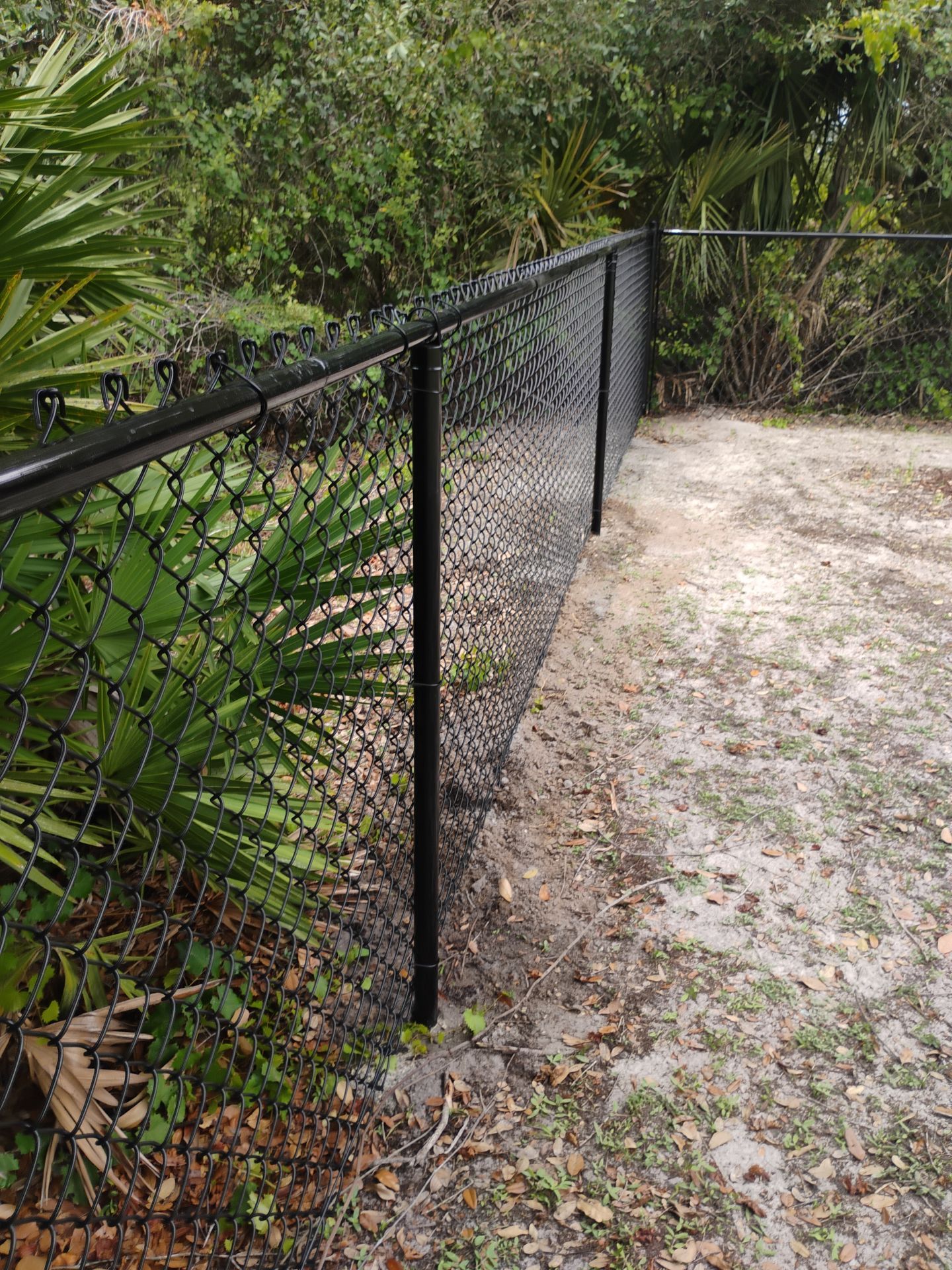 Residential Black Chain-Link Fence Installation in North Port by True Fence LLC