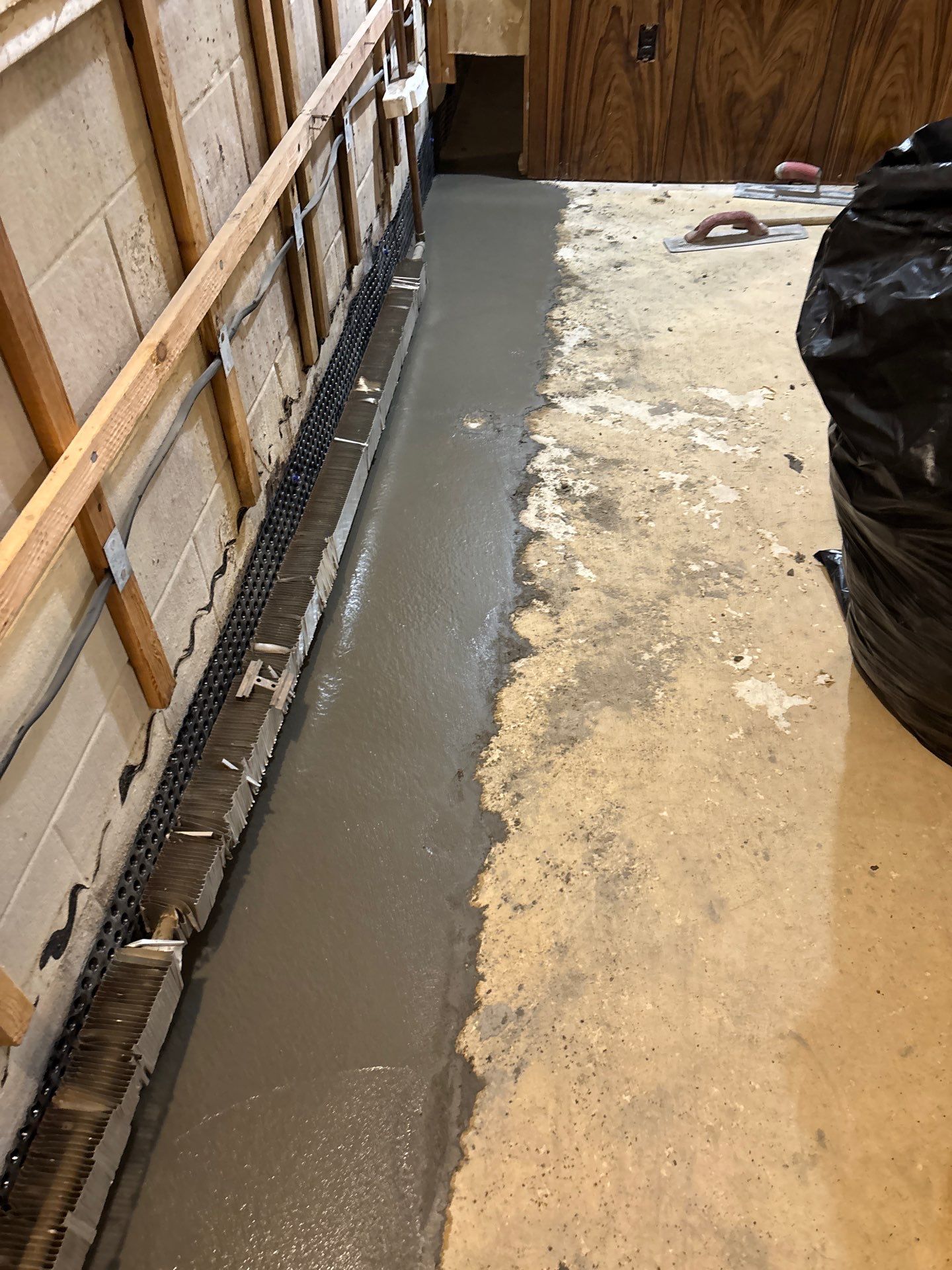 Drain Tile, Sump Pump & Buried Discharge in Columbia Heights by Waterproofing Northeast