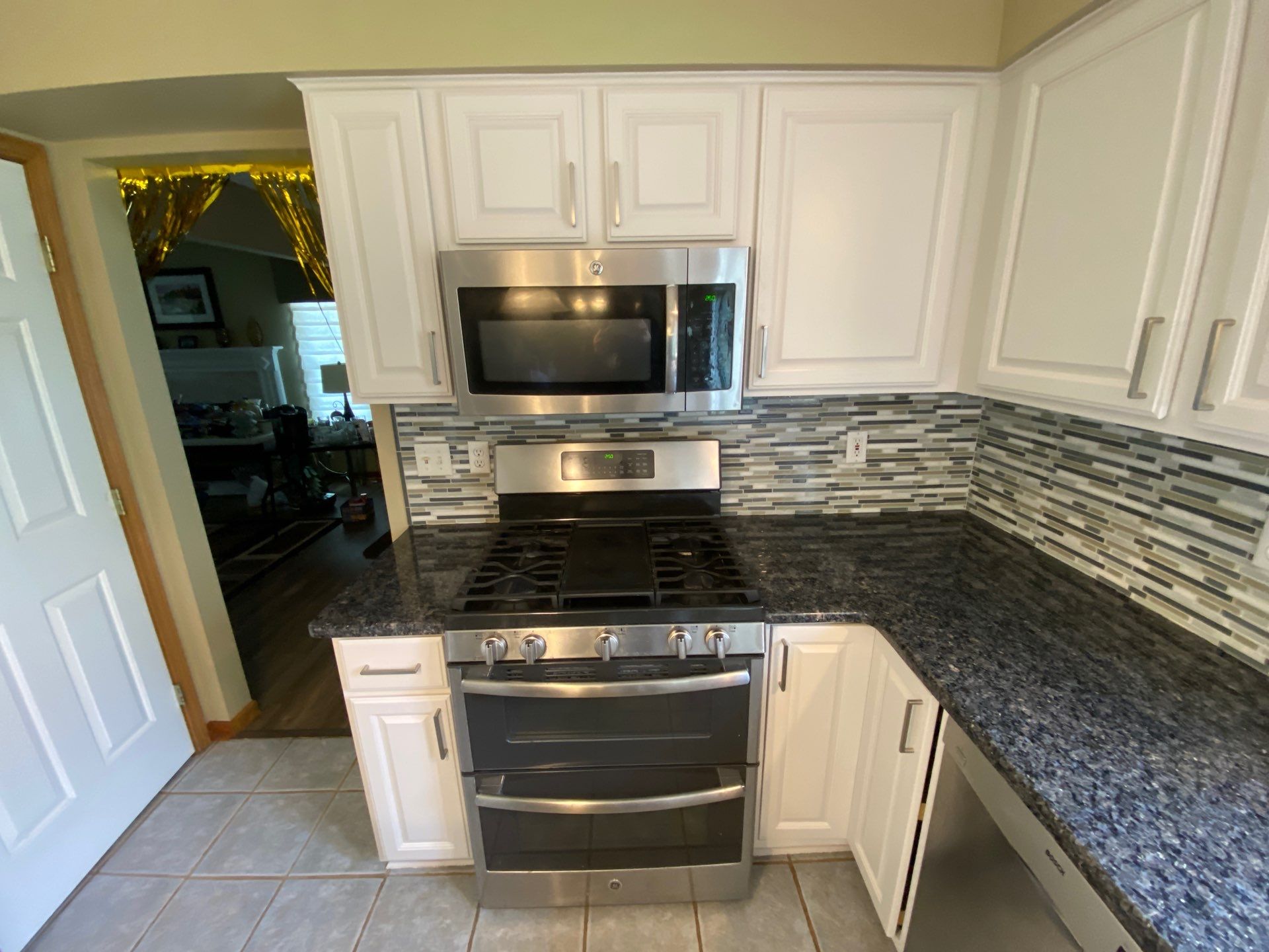Kitchen Cabinet Refinishing and Hardware Upgrade in White Lake by Top Shelf Painter