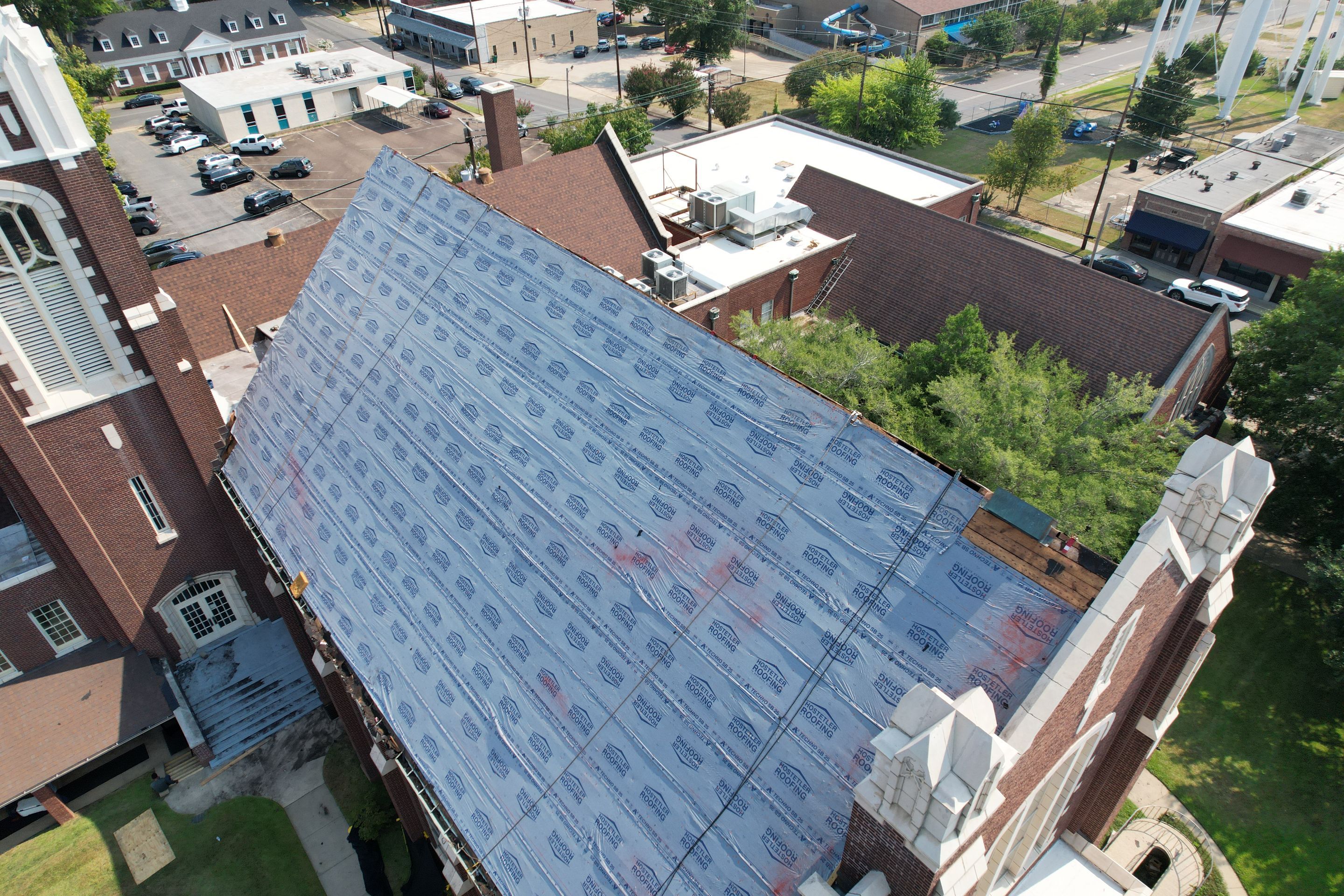 Commercial Roof Replacement using Malarkey Vista Shingles and 50 mil PVC by Hostetler Roofing