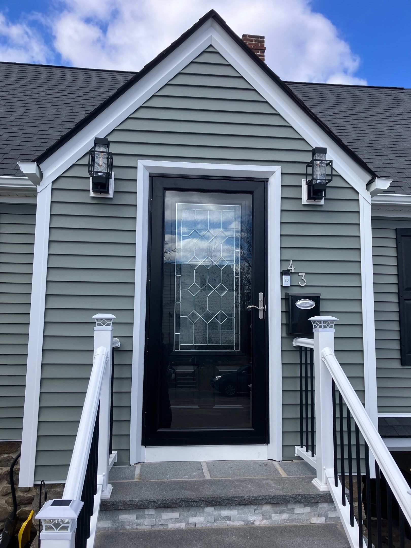 Entry Door Upgrade with Modern Glass Detail by DiGiorgi Roofing and Siding Inc