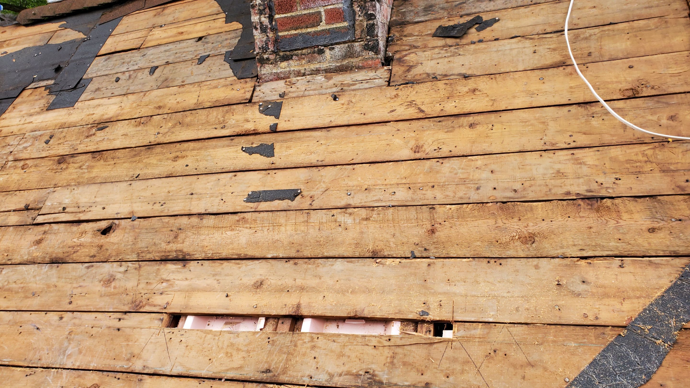 Residential Roofing Installation using Certainteed Belmont shingle by Absolute Roofing and Construction