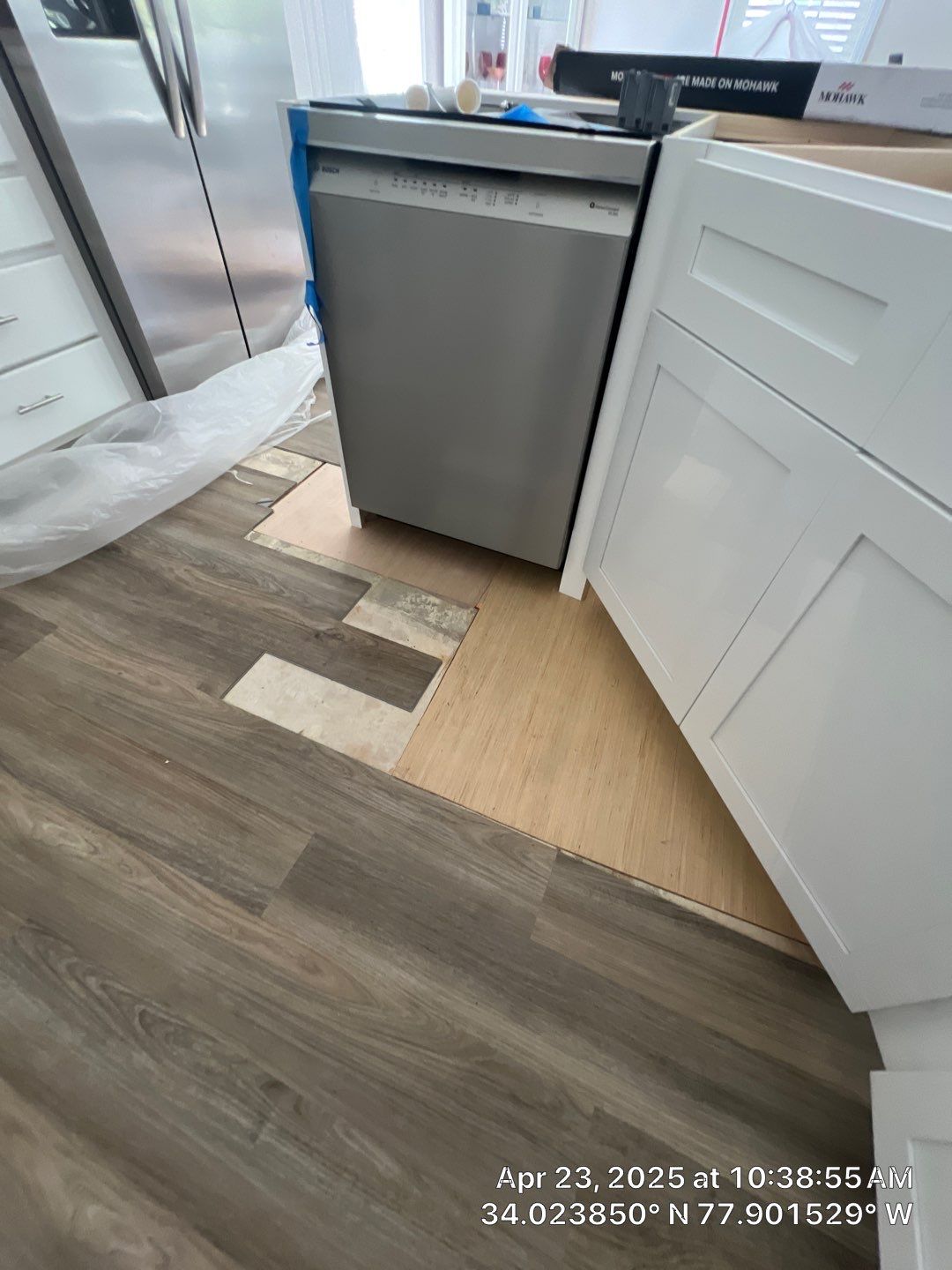Water Damage Restoration using Mowhawk Flooring by RGR Construction and Roofing, LLC