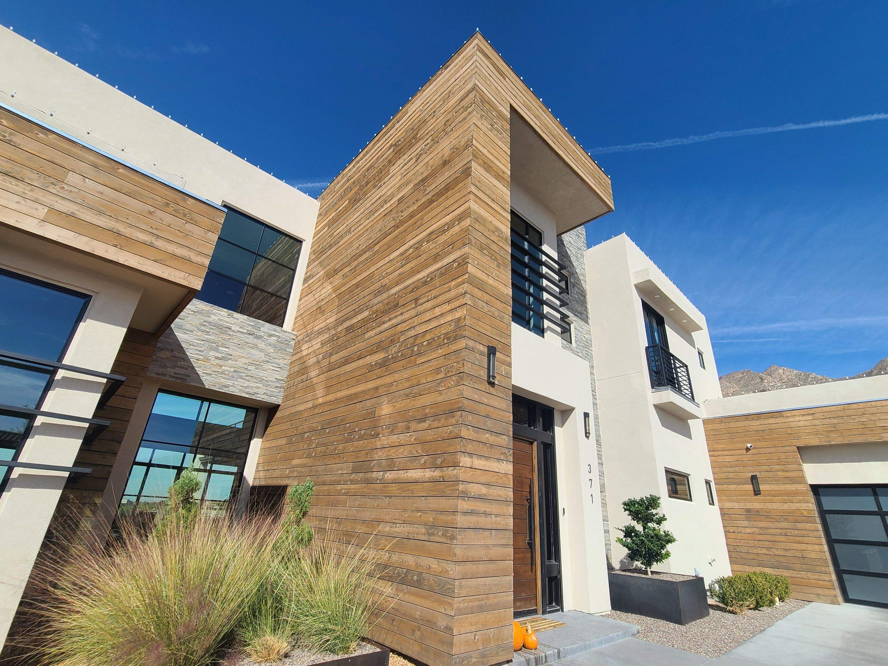 Exterior Wood Staining and Composite Decking Installation by Regal Renovate