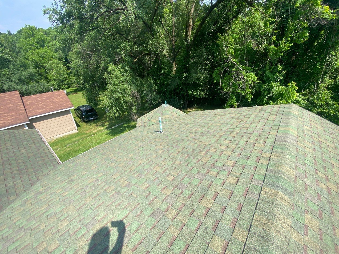 Residential Roofing Install - Atlas Pinnacle Pristine Architectural Shingle - Color Green  by Titan Commercial & Residential Roofing 
