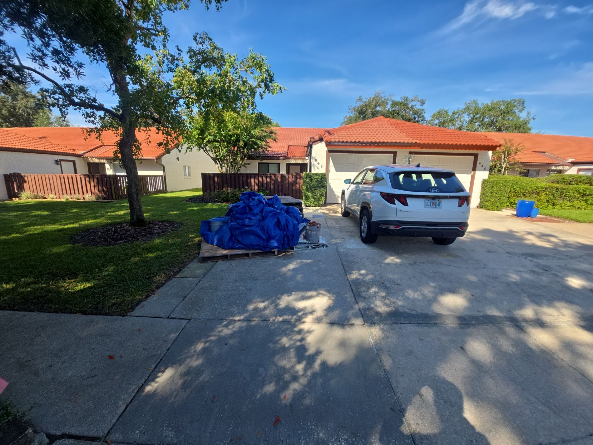 Residential Tile Roof Replacement and Gutter Installation in Winter Park