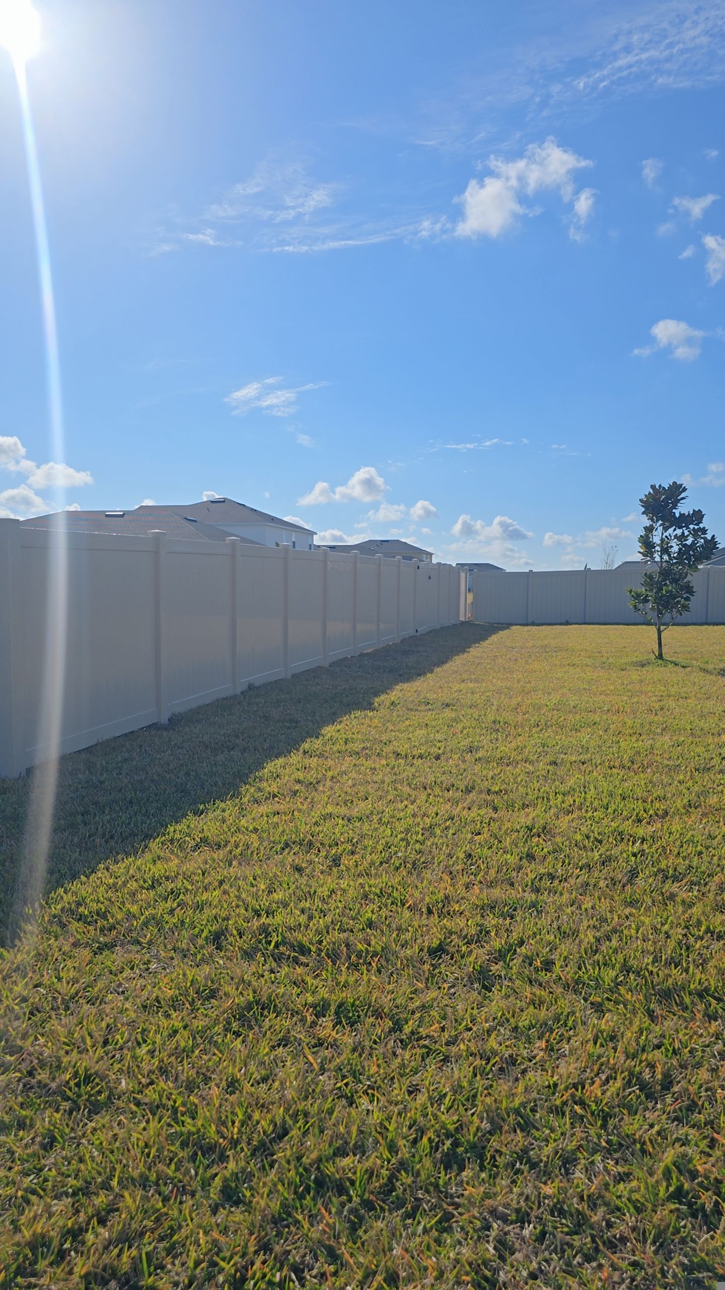 Tan Vinyl Fence in West Port by True Fence LLC