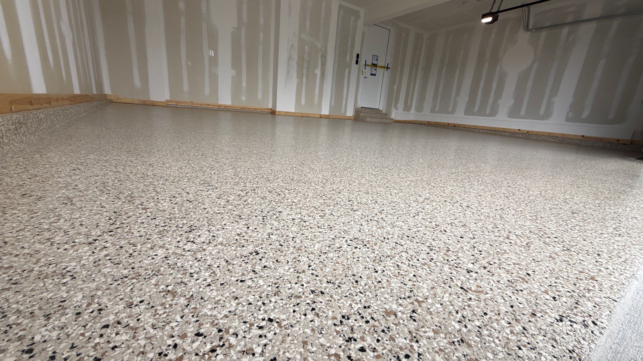 Mark Chose The Best Time To Do His Floor, Right Before Move In  by Banner Garage