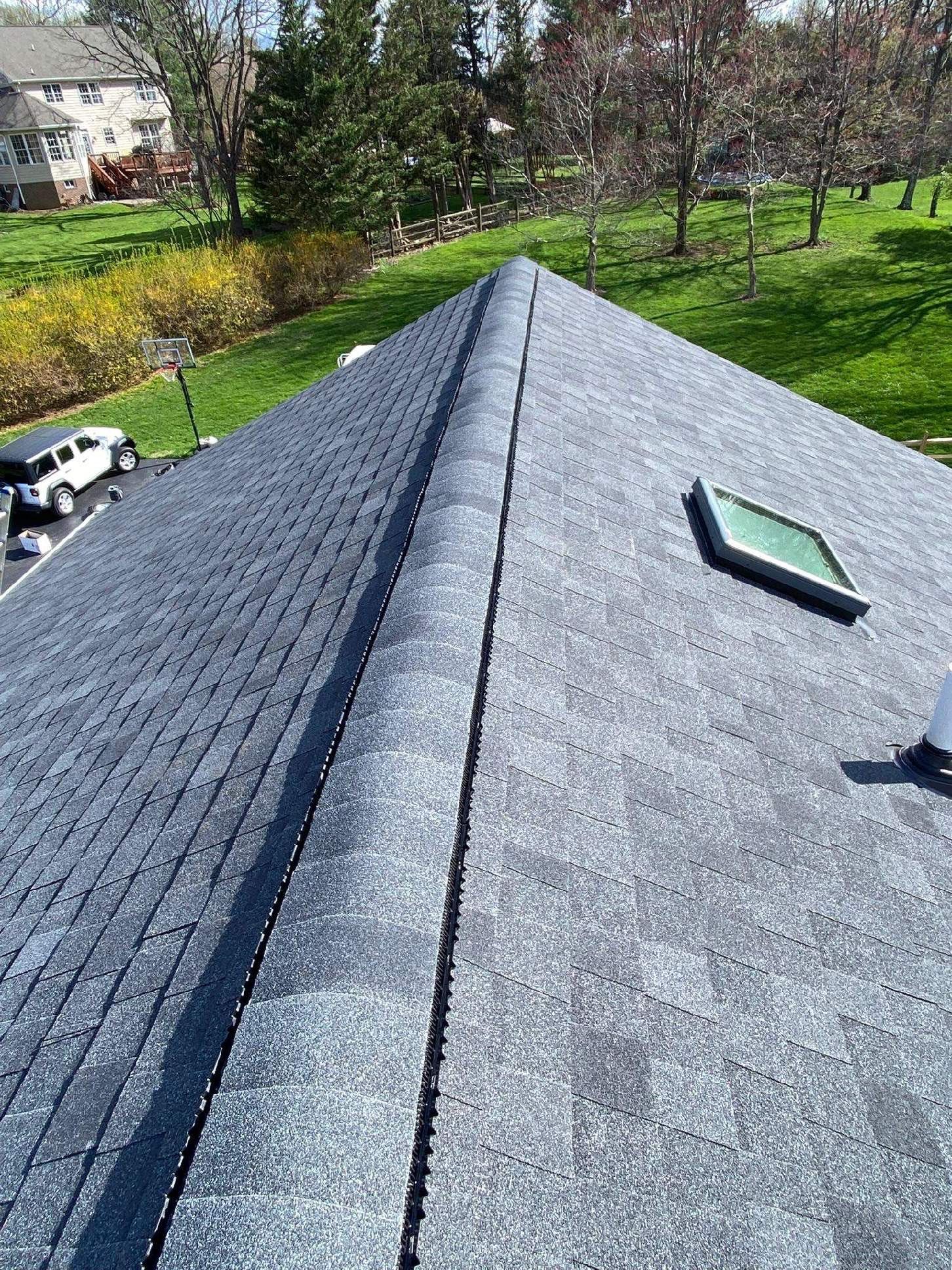 Residential Roofing Installation using Atlas Pinnacle Pristine Black Architectural Shingles by Frederick Roof Repair