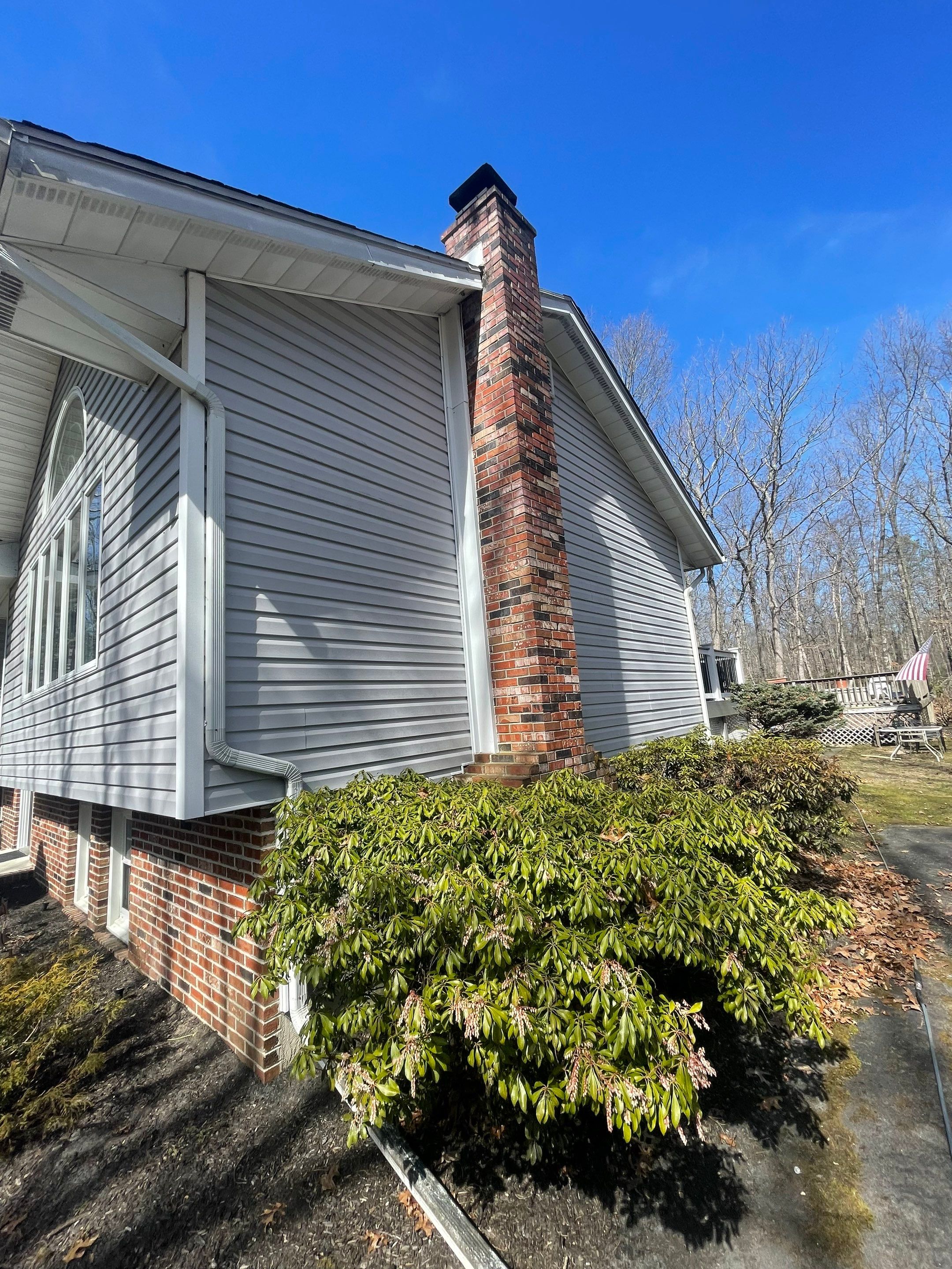Pressure treated wood deck cleaned by SJ Exterior