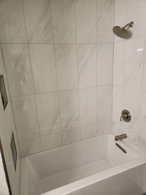 Austin Bathroom 2 and a half Remodel Featuring Tile and Custom Niches