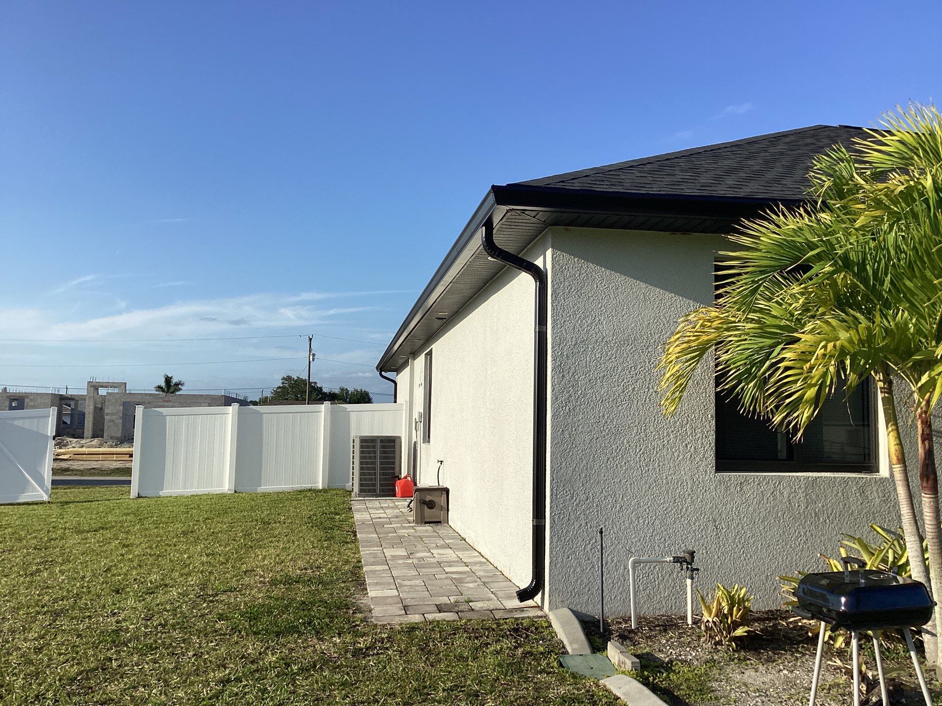 Black Seamless Gutters using 6 Inch Seamless Gutters in Cape Coral FL by Gutter Professors