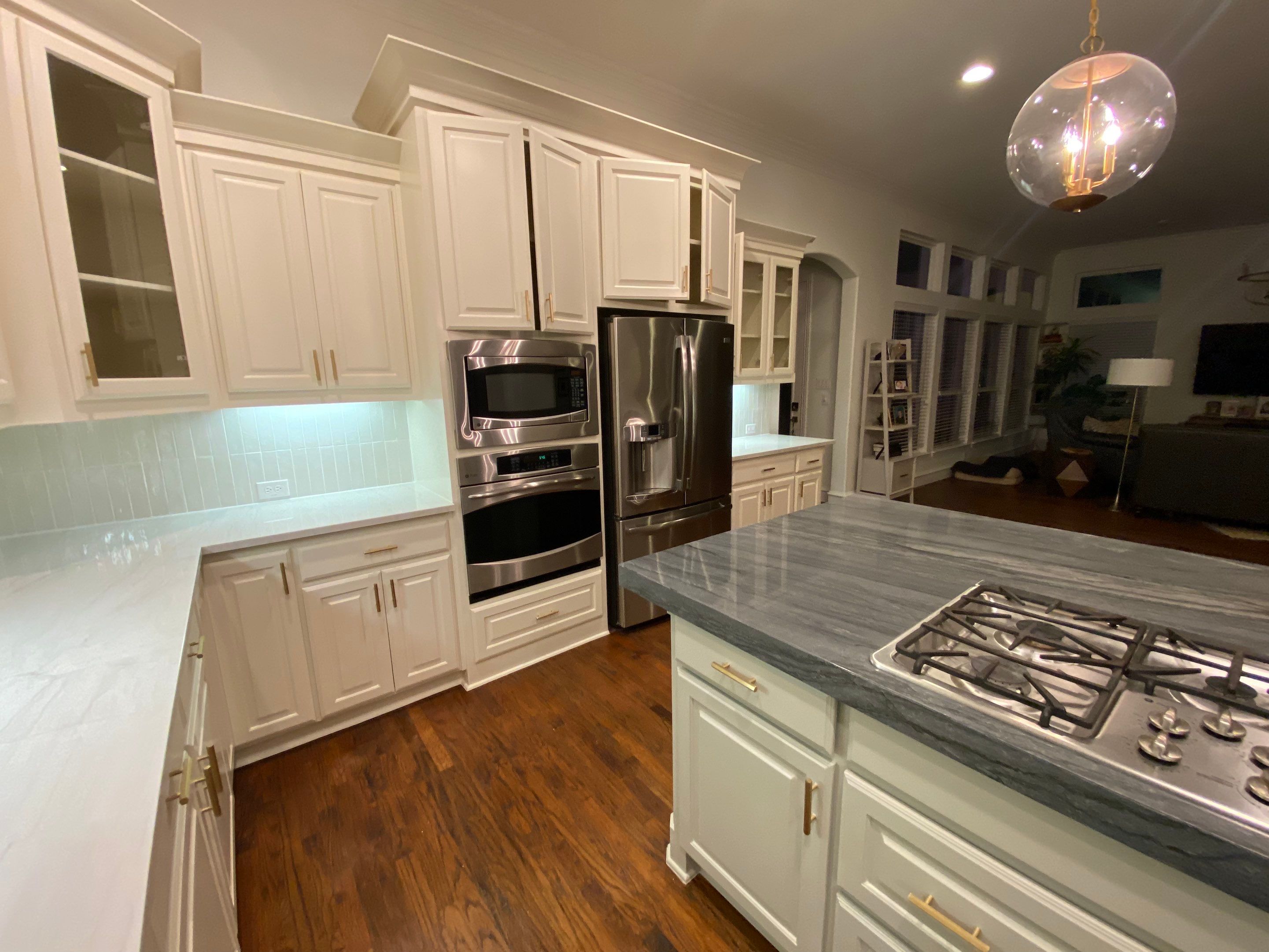 Kitchen Remodel using Quartzite by SLM General Contractors & Roofing