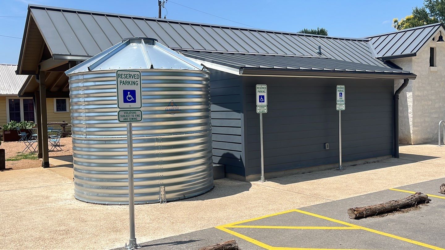 5000 gallon Wimberley Community Welcome Center using Meridian 5000 gallon, 30 degree pitched roof, silo style by Hill Country Rain Water