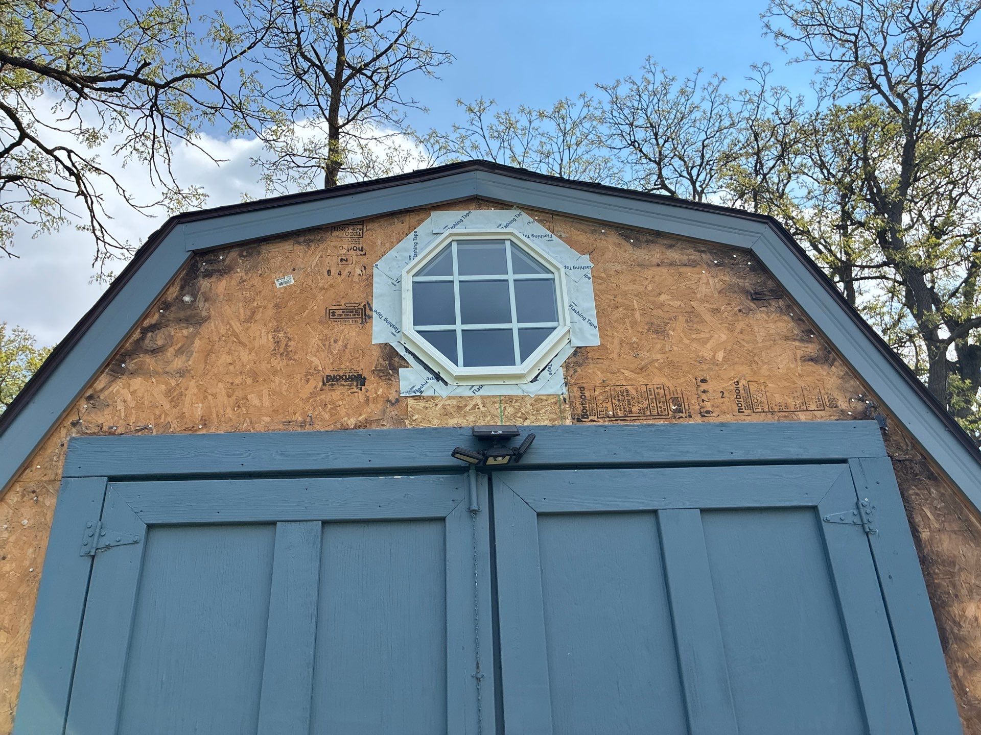 Evening Blue Siding and Window Replacement in Glenwood, Iowa by Carps Complete Exteriors 