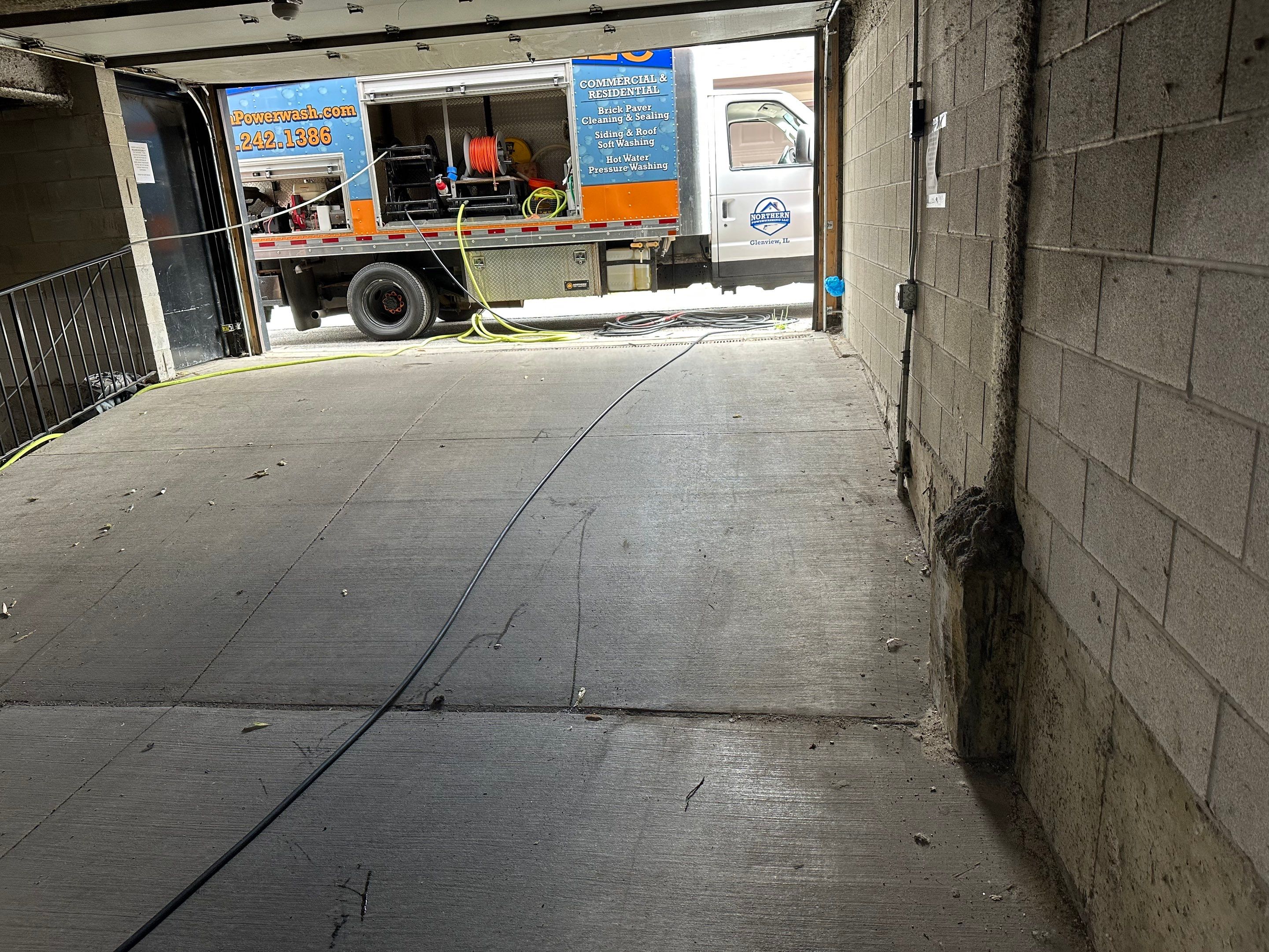 Parking garage cleaning using Hot water by Northern Power Washing LLC.