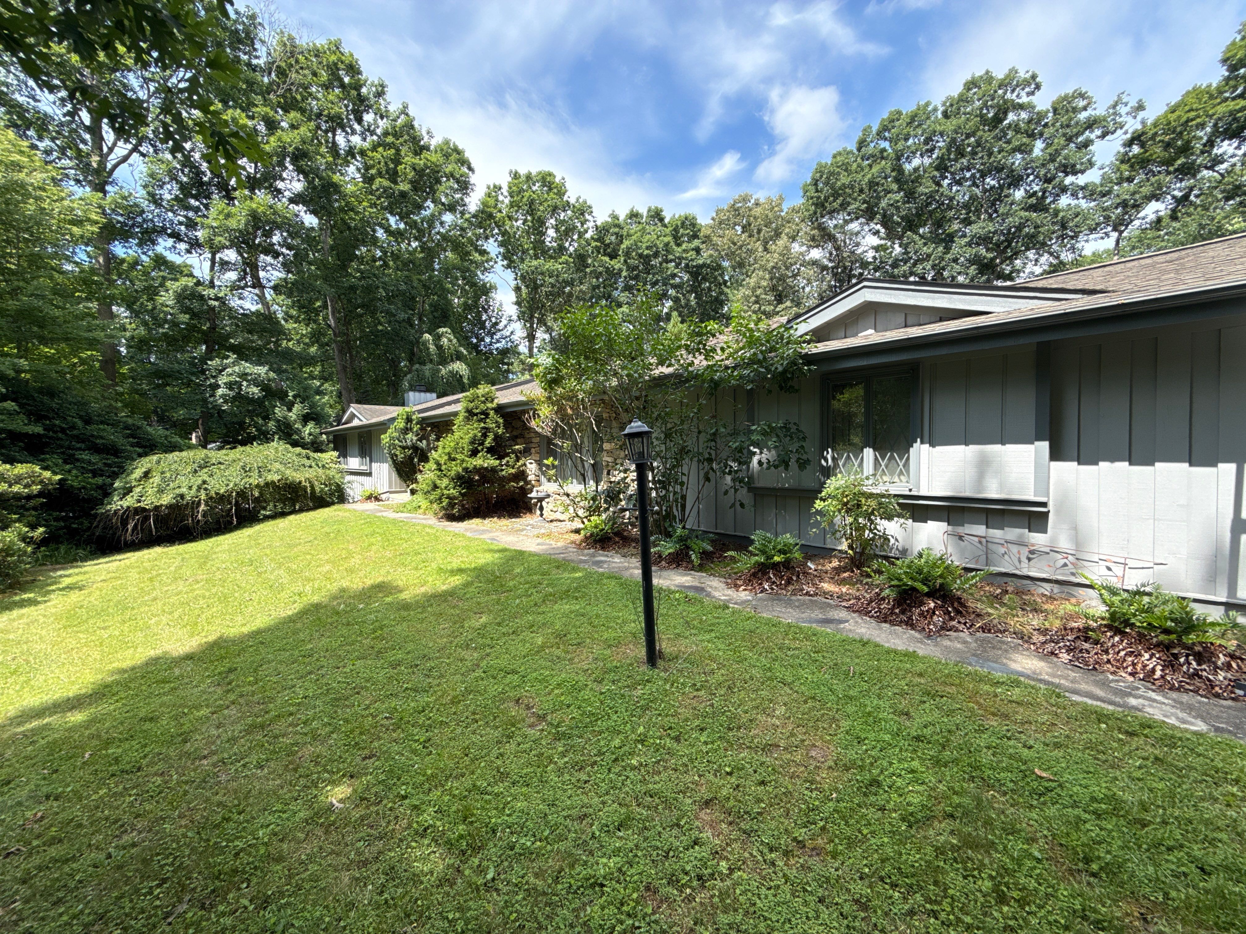 Residential Roof Rejuvenation and Exterior Surface Cleaning in Hendersonville