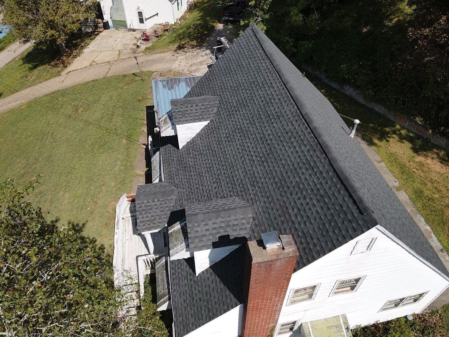 Residential Roofing Installation using GAF Timberline HDZ Charcoal by Rainstoppers Roofing