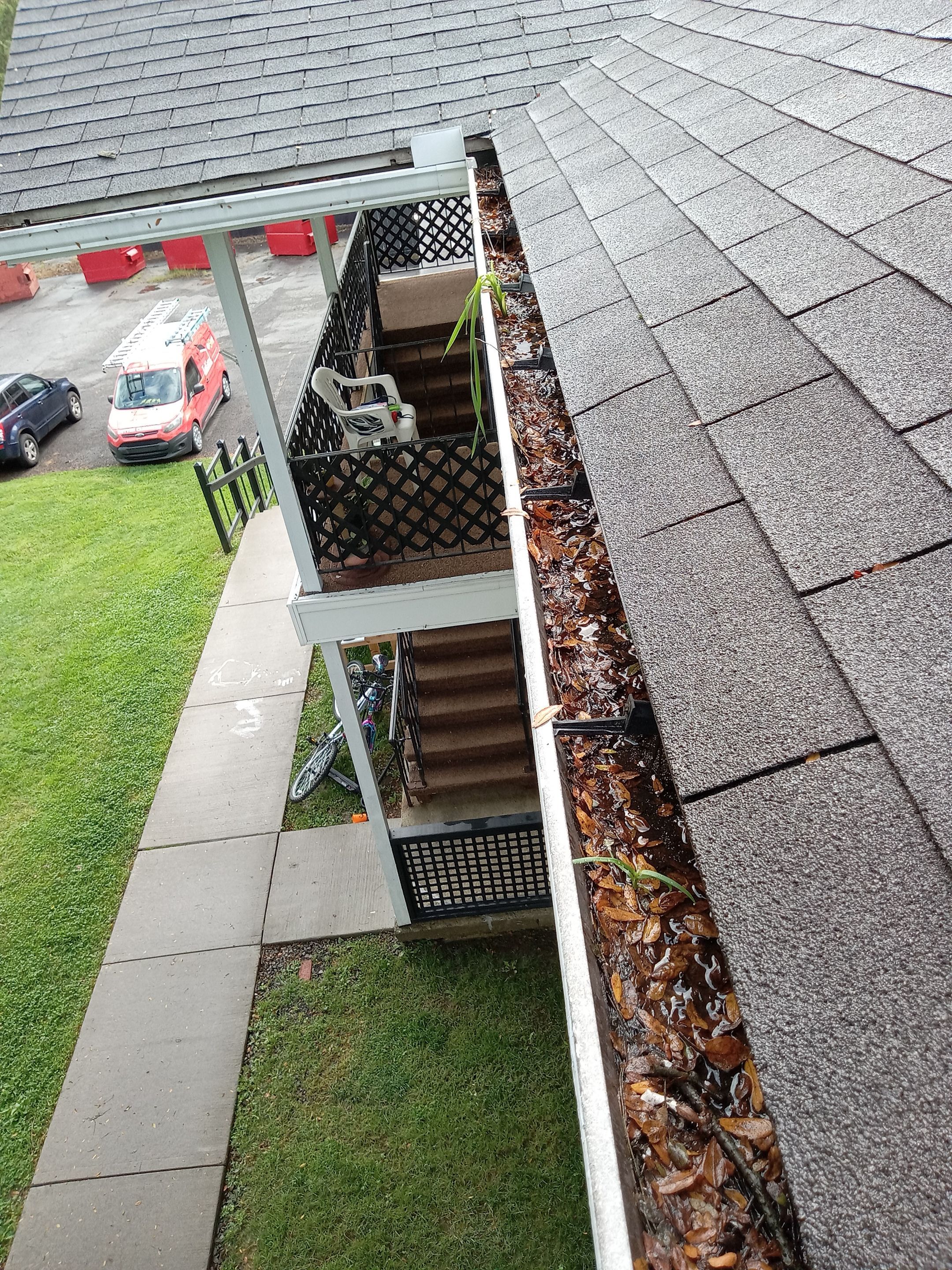 Commercial gutter cleaning Scranton & Wilkes-Barre, PA before photo with filled gutters